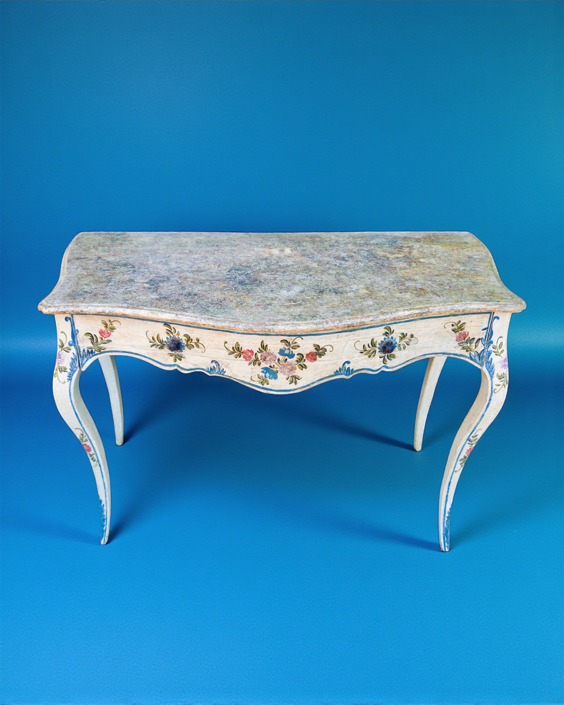 SOLD: A Genoese LXV, laquered polychrome flower decoration on a white ground, side table with faux marble top. Mid XVIII Century.