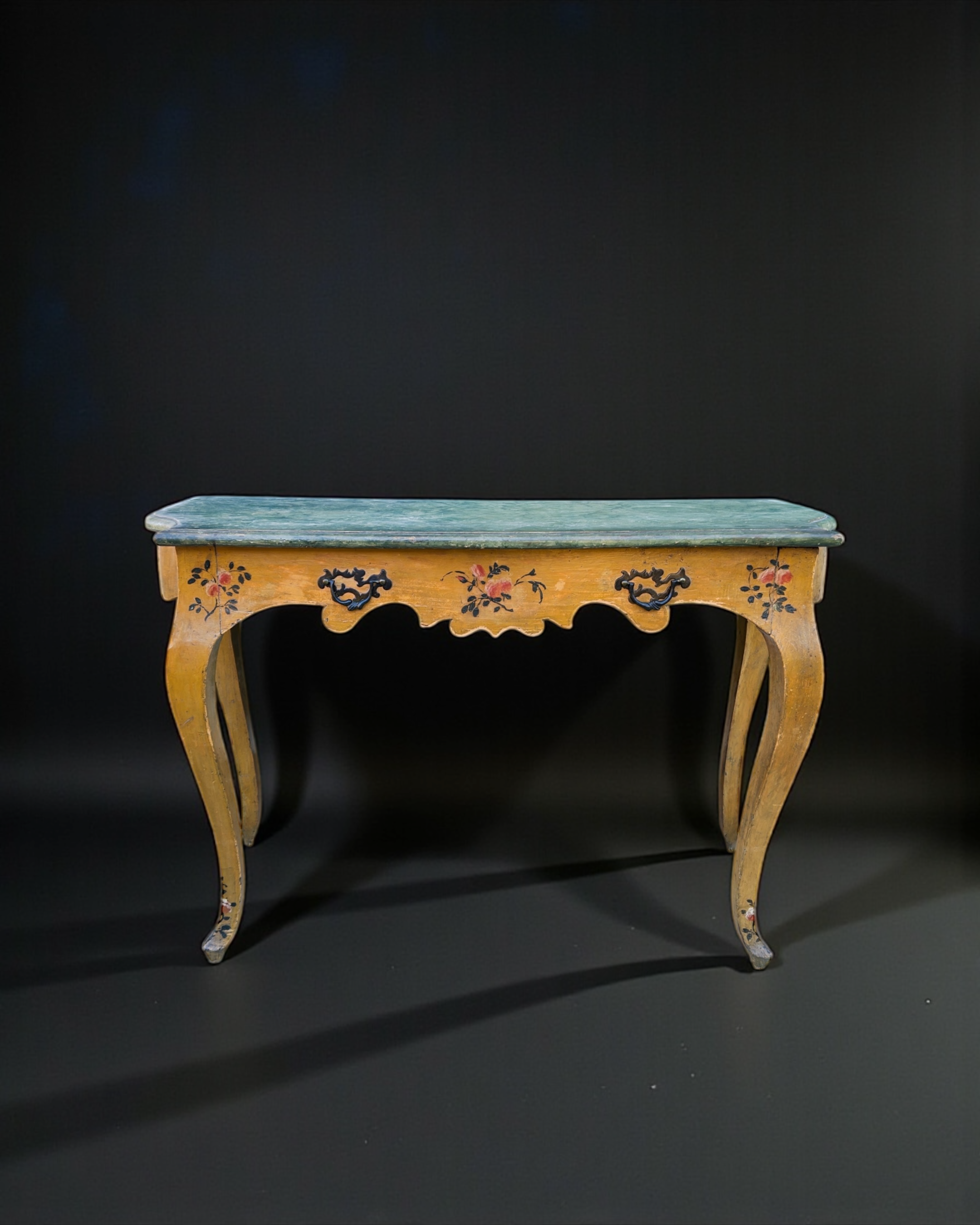A Genoese LXIV, laquered polychrome flower decoration on a yellowish ground, side table with faux marble top
