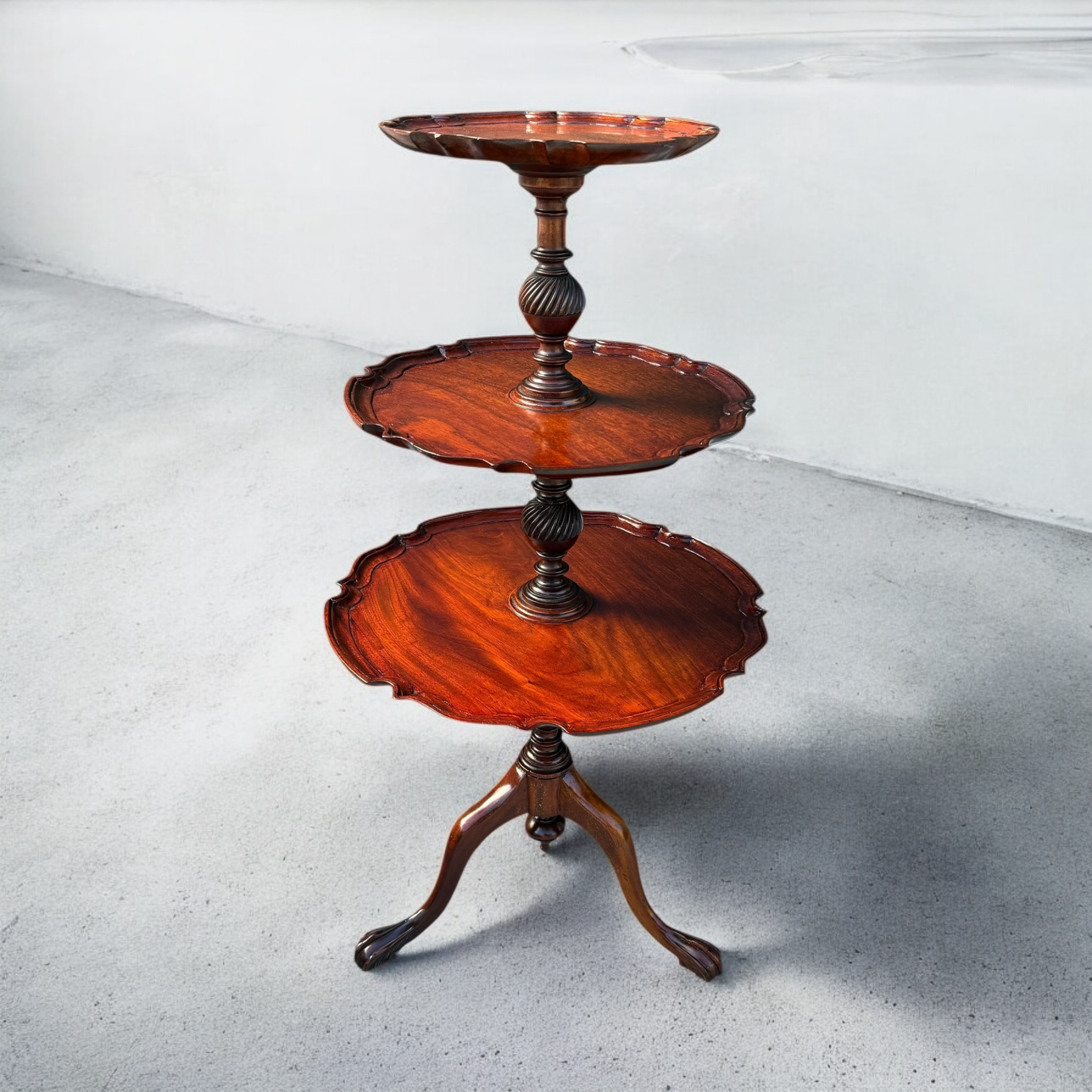 SOLD: An English three tier circular mahogany table