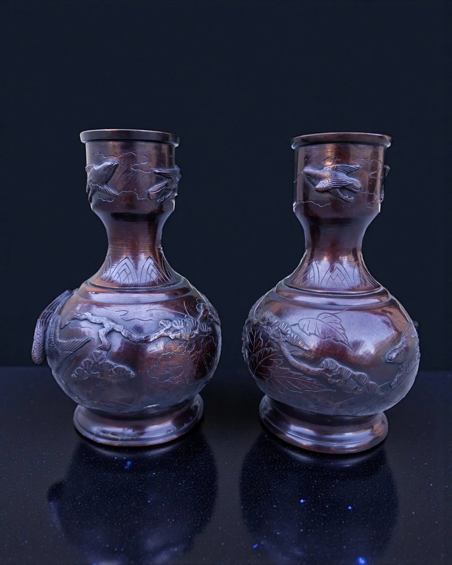 A pair of bronze vases. Japan.