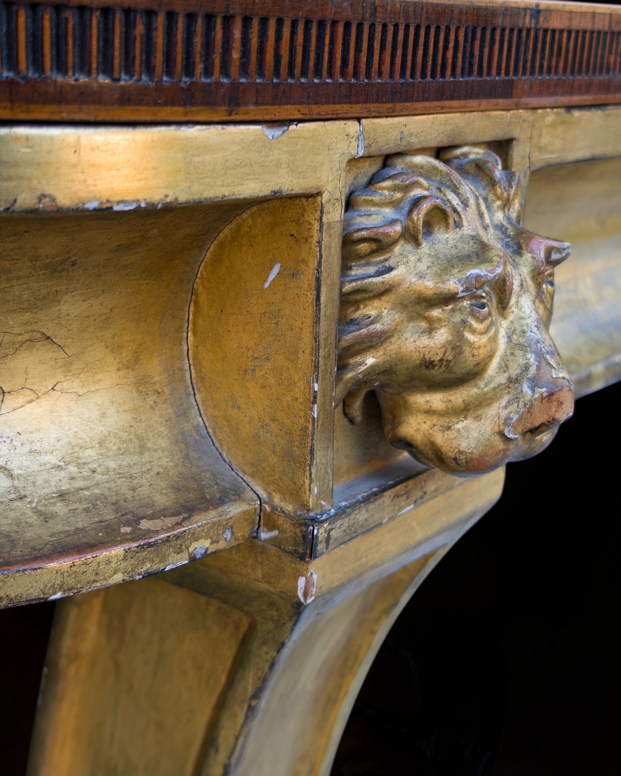 A fine Sheraton carved and gilded consolle table with a top venereed in rosewood and satinwood20.PNG