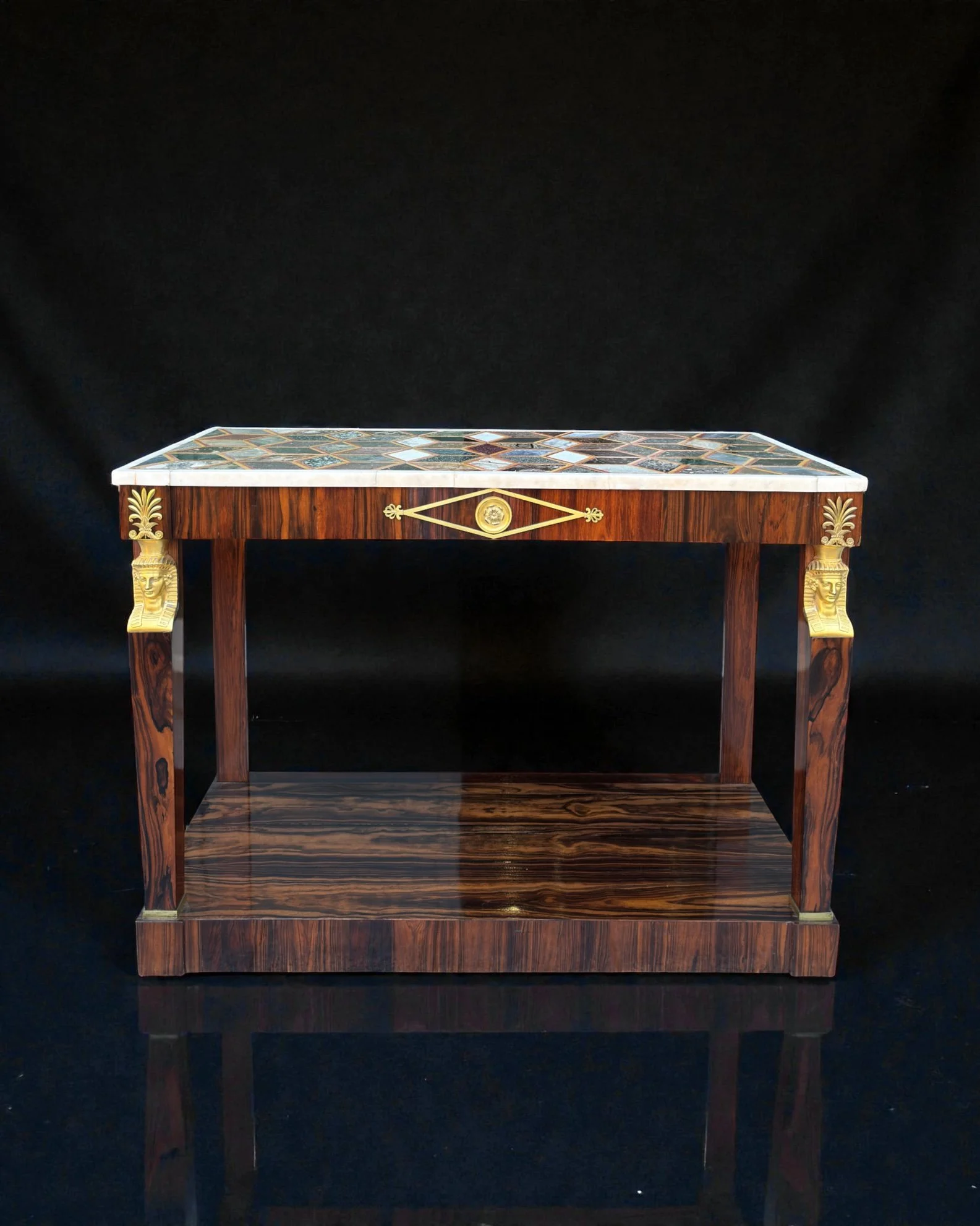 An empire, rosewood venereed, ormolu mounted consolle table