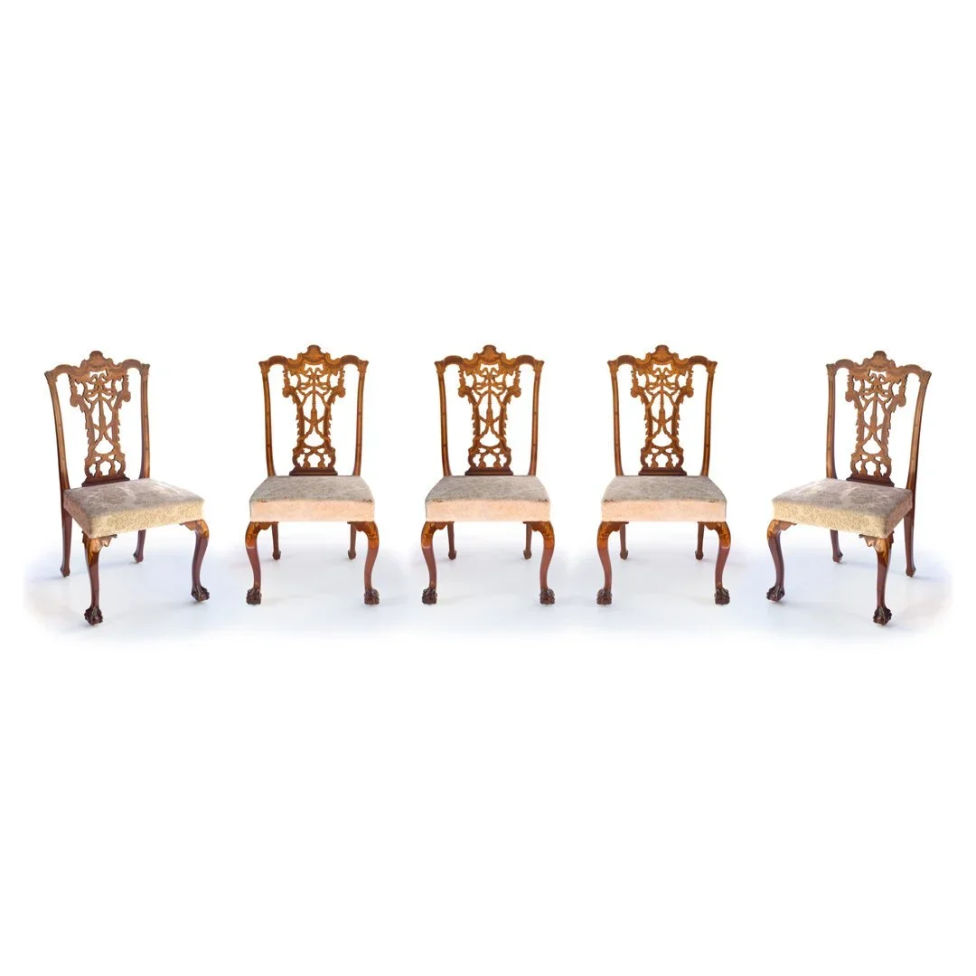 Series of five finely inlaid mahogany chairs.