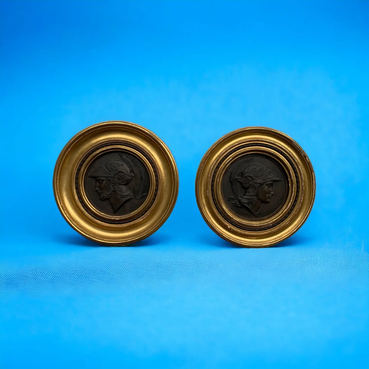 SOLD: Pair of medallions in bronze depicting two warriors with helmet