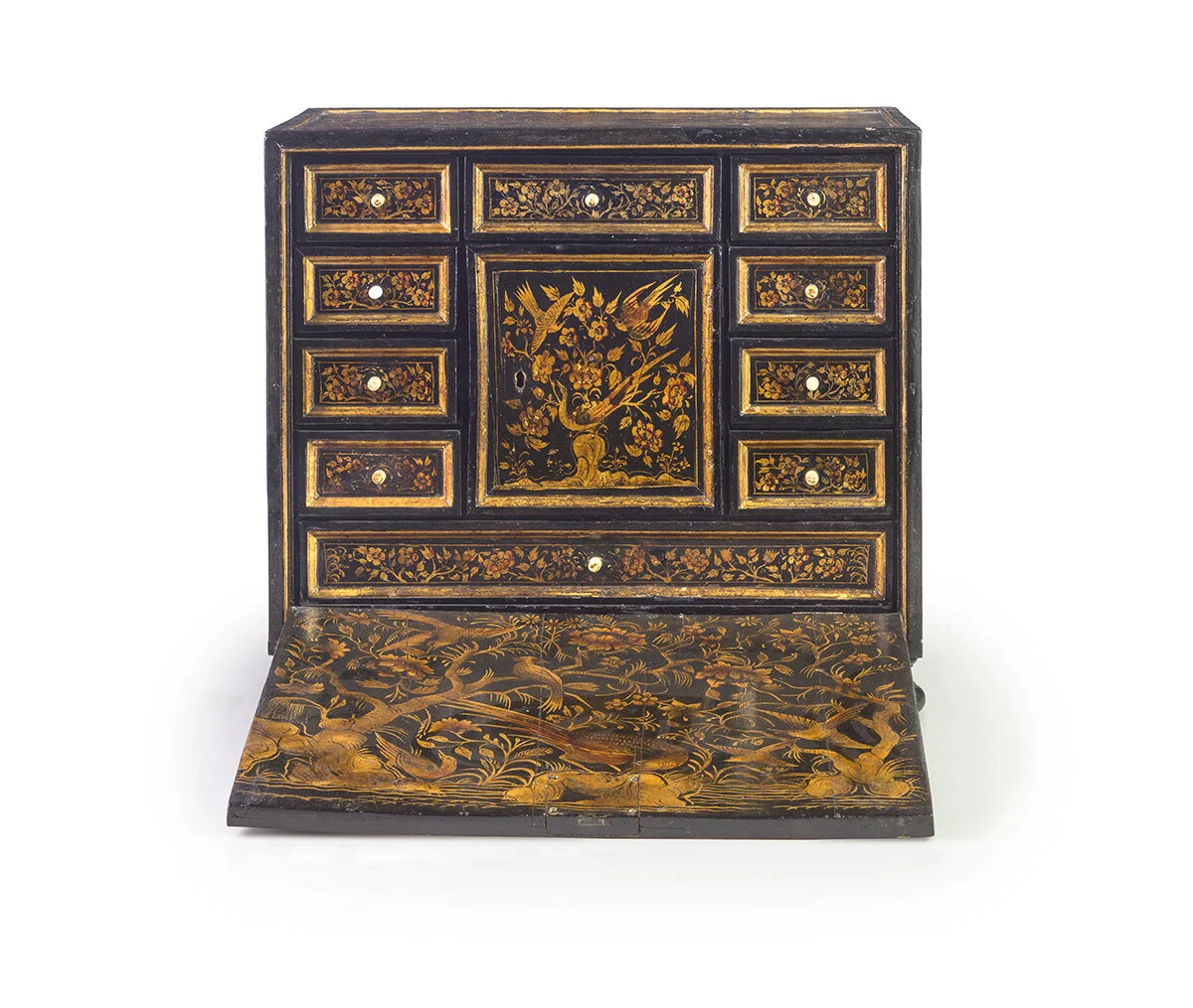 Black and gold antique wooden jewelry box with multiple drawers and intricate floral and bird designs, some drawers partially open show compartments inside.