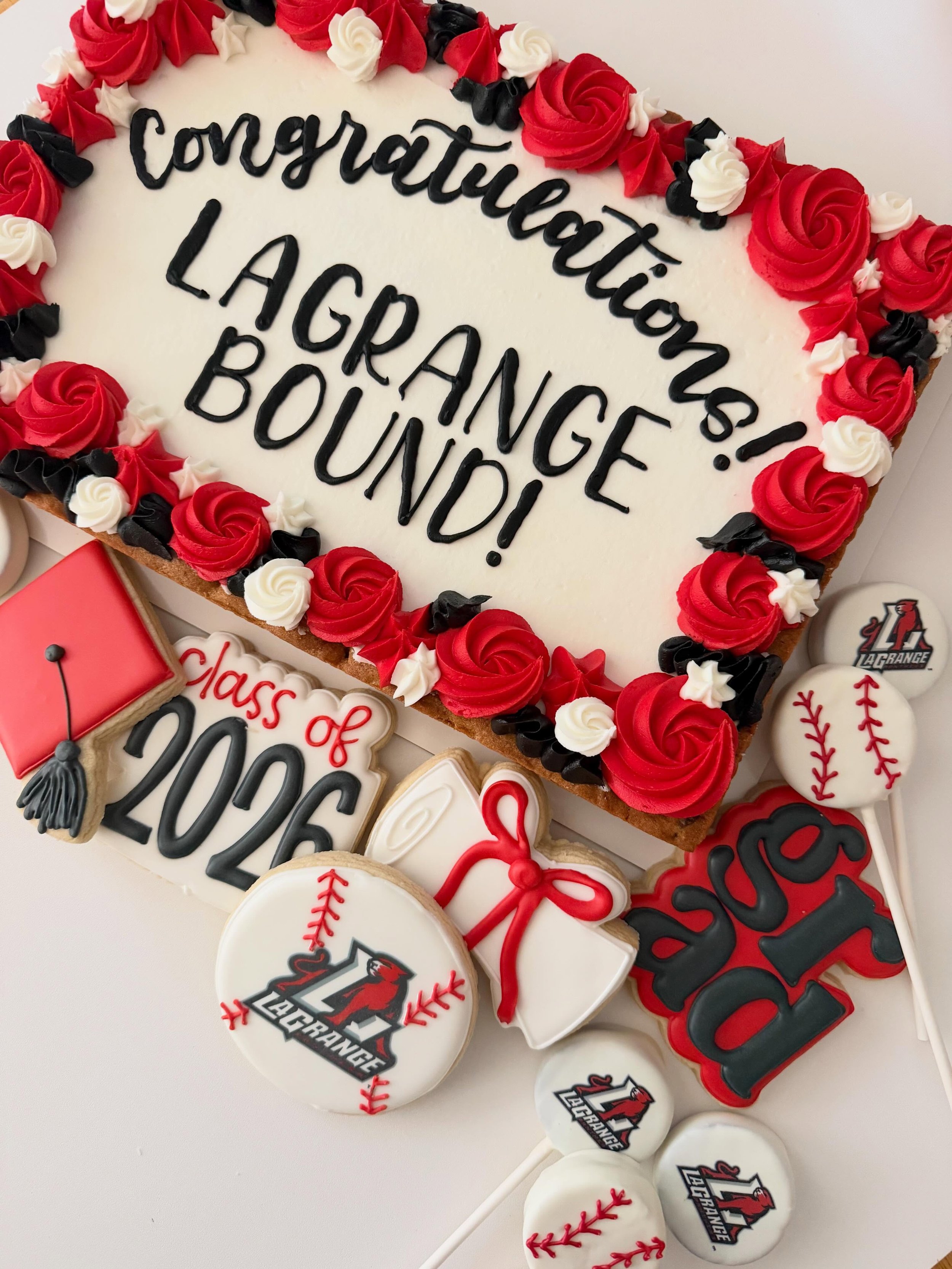 Another graduation set out the door! Cookie cake, sugar cookies and cake pops!