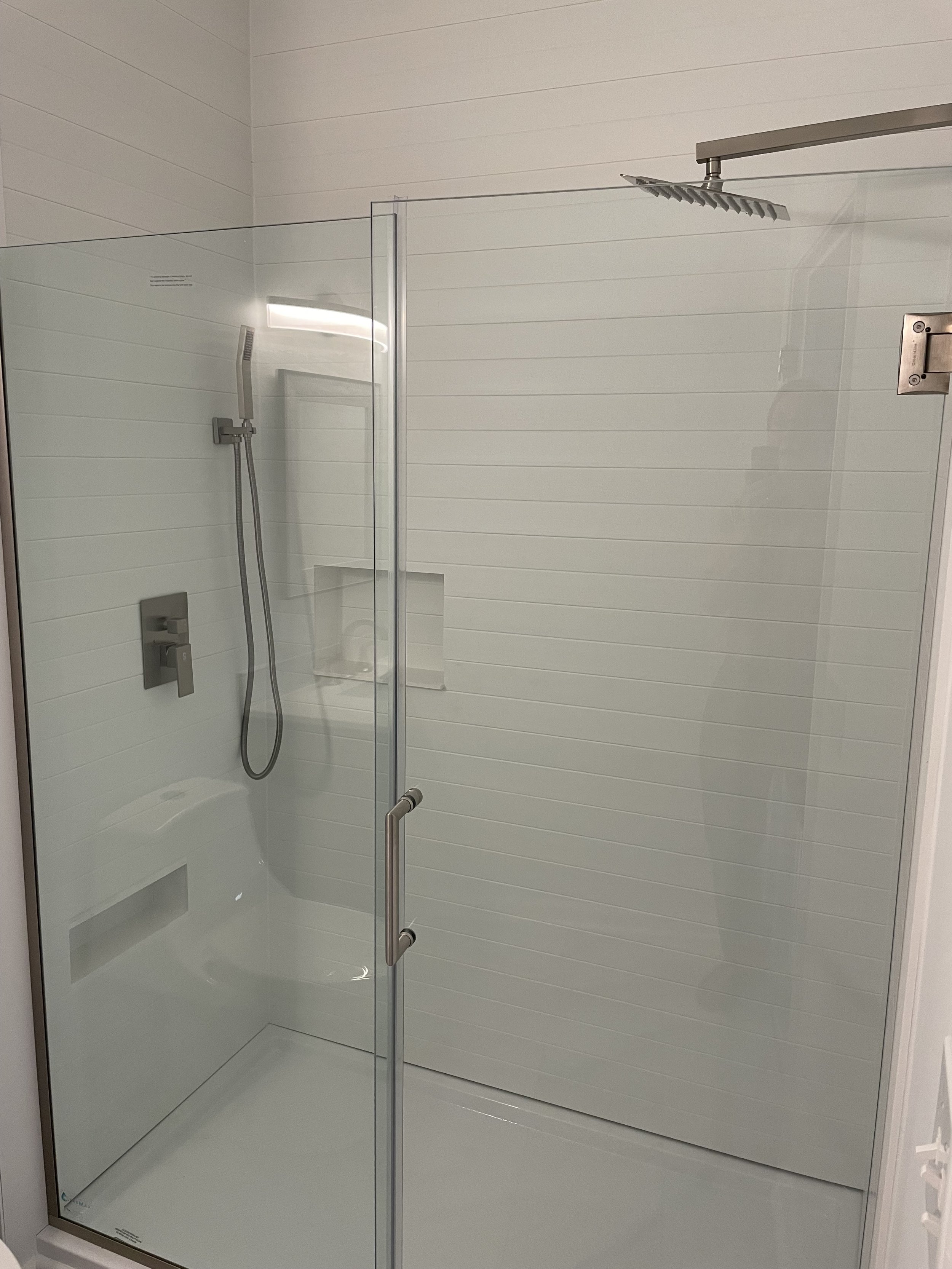 Doors are hinged to the wall or glass panel depending on the bathroom layout