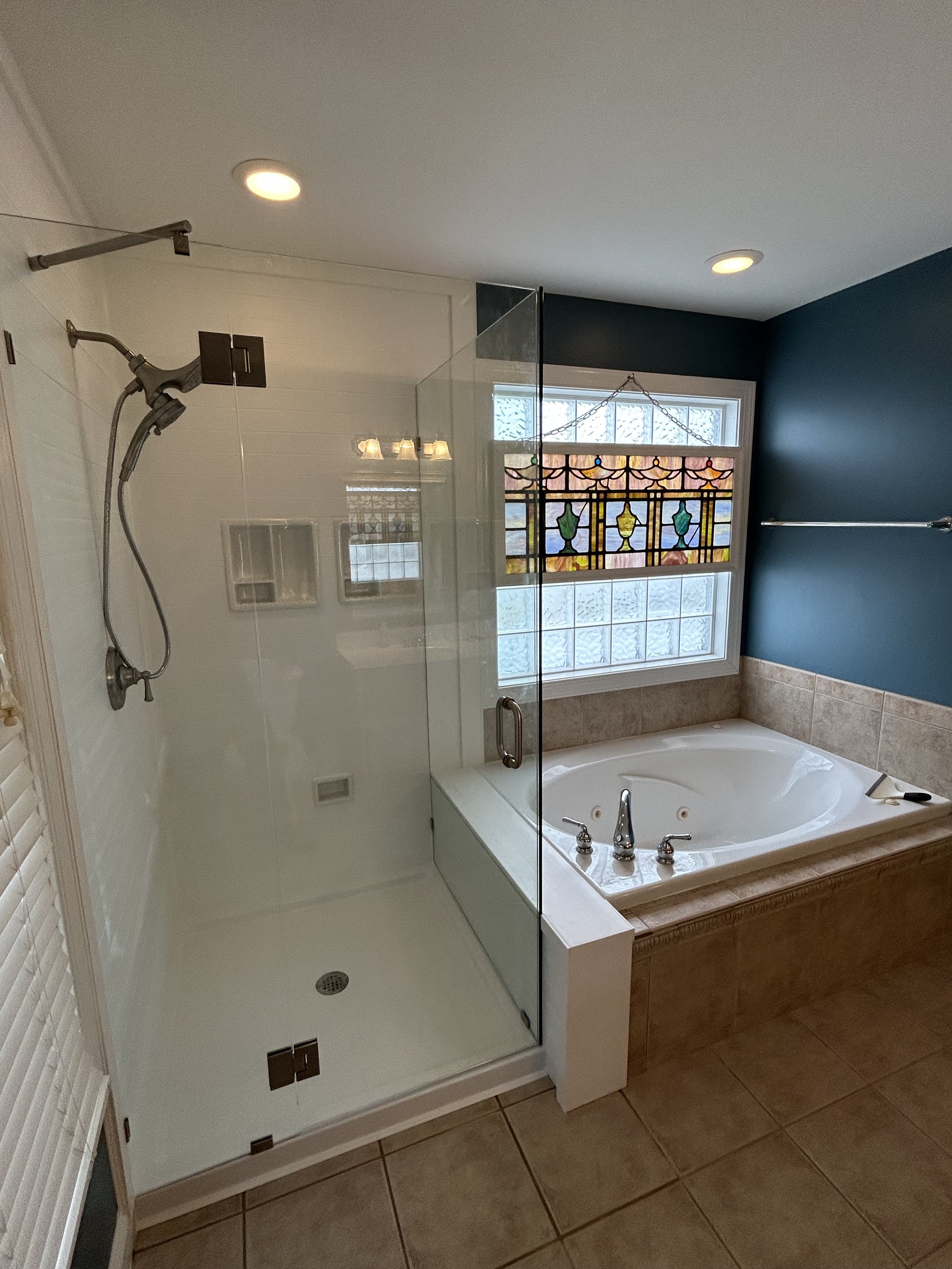 Keep that jacuzzi tub but modernize the shower