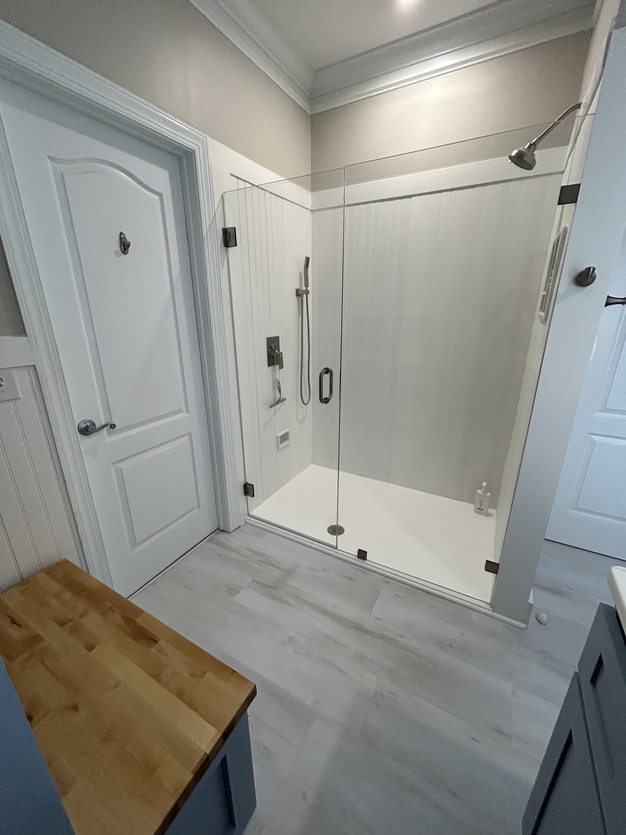 PVC bead-board shower walls are an almost maintenance-free option for walk-in showers.