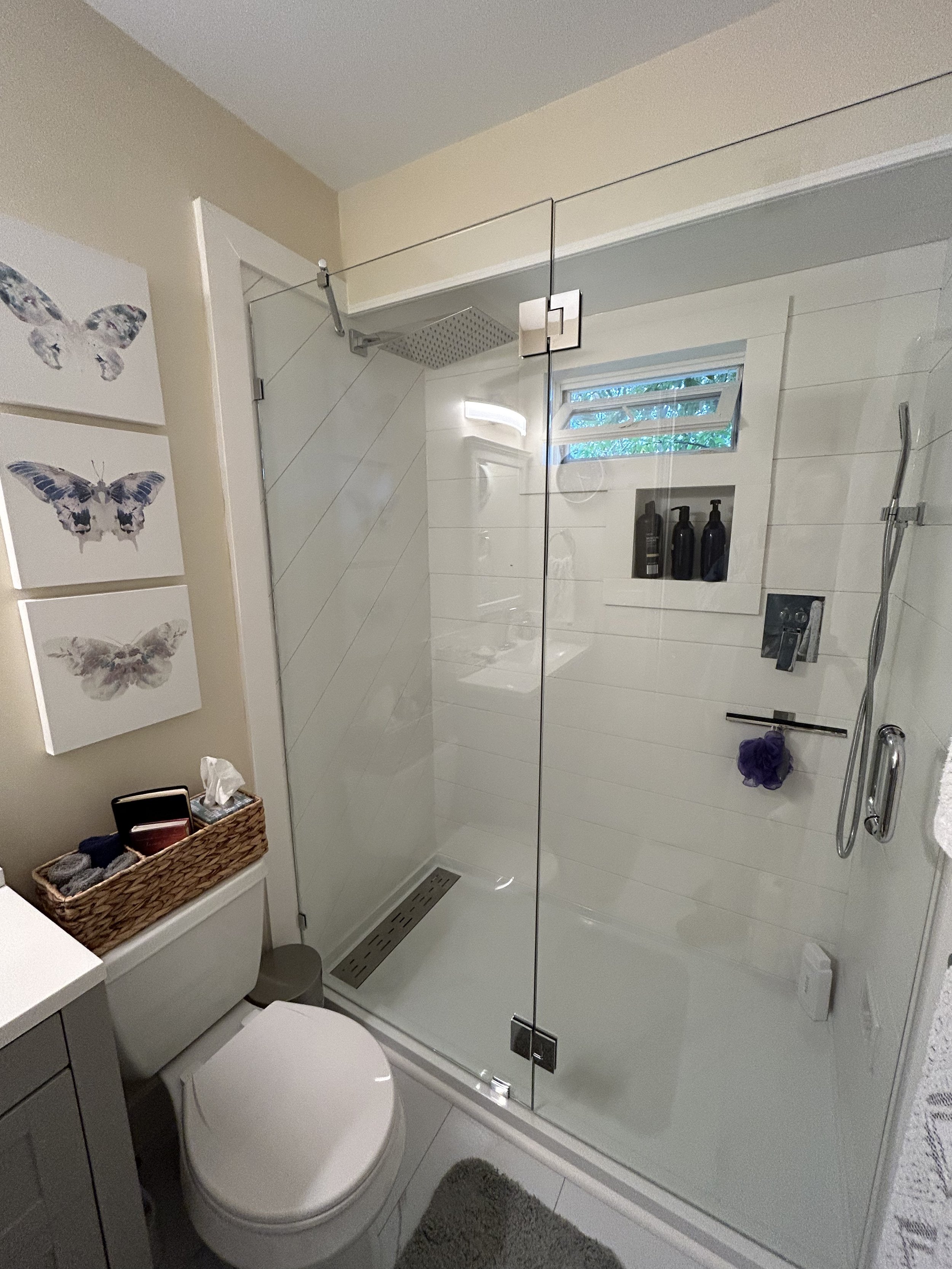 The push-button shower system allows for the rain-head and the wand to operate individually or simultaneously