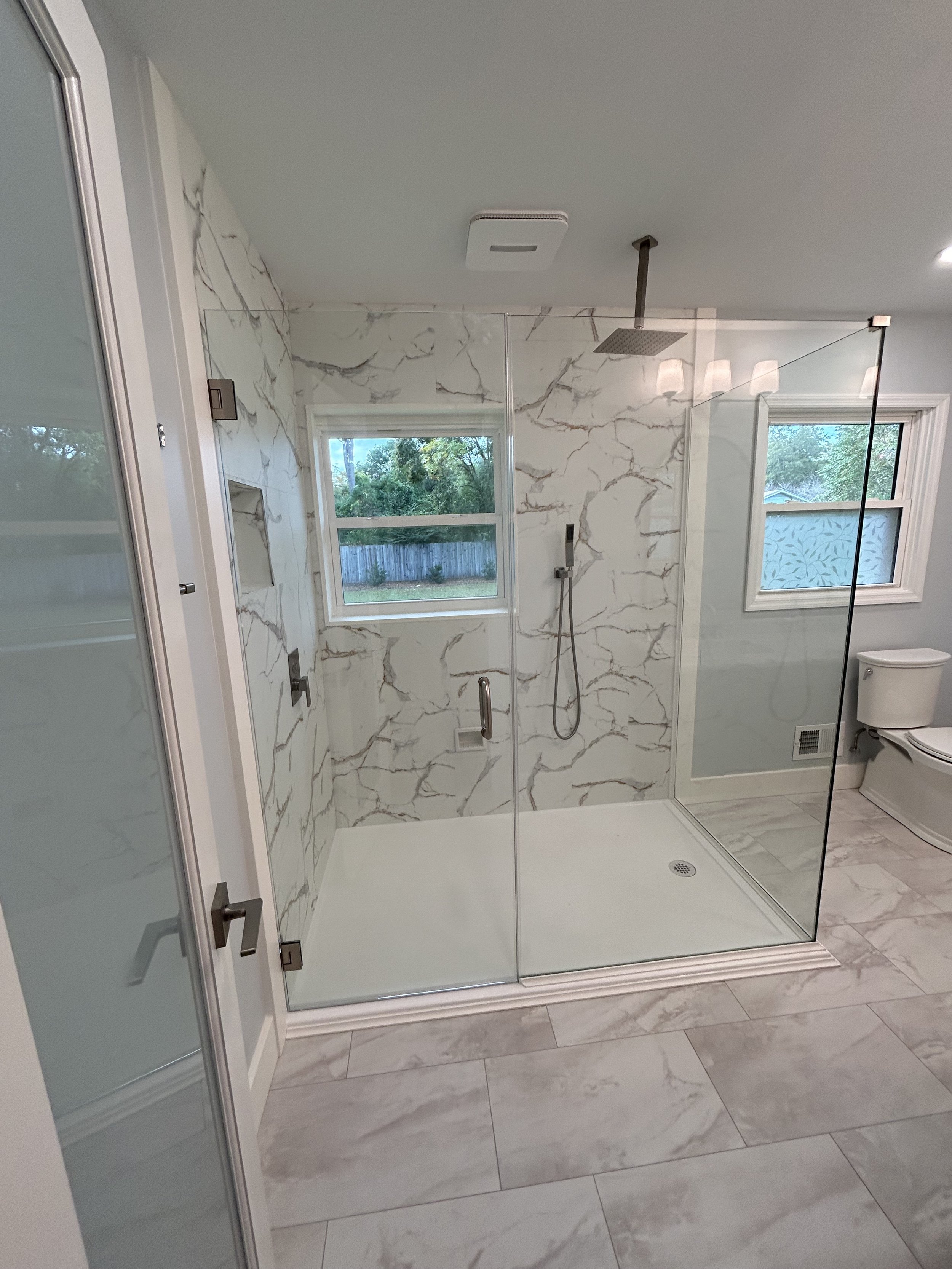 We only use frameless glass in our showers.