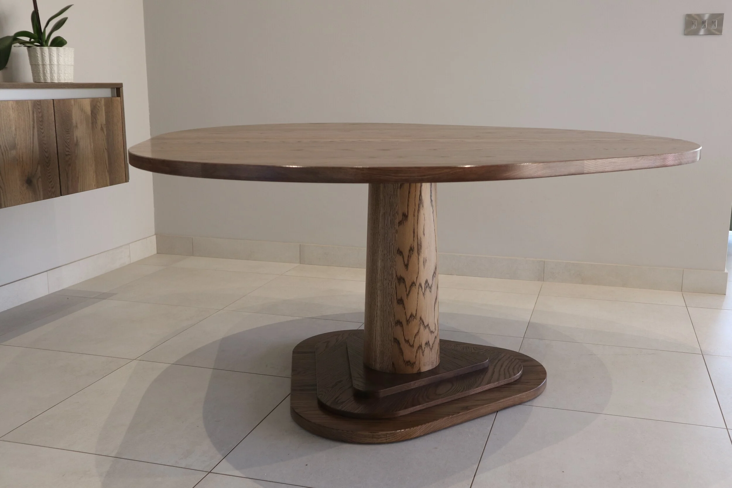 Dark Oak table with contemporary pedestal base.JPG
