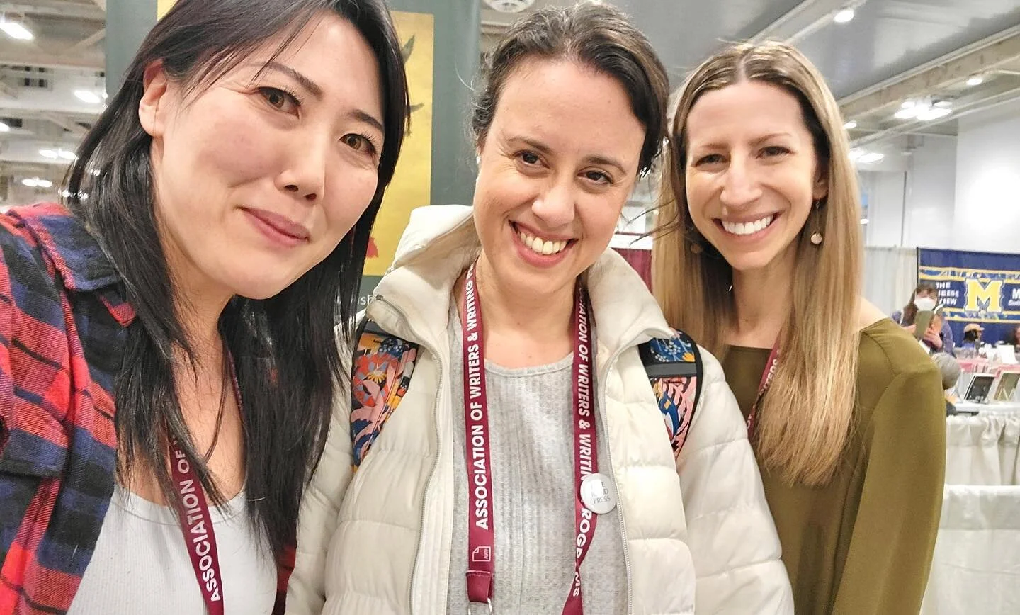 The publisher pictured here (at right) with her two powerhouse authors was so exuberant on days 1 and 2 of AWP that she lost her voice by day 3, but she sends her raspy, overwhelming gratitude to all those who stopped by the press table. The bookfair