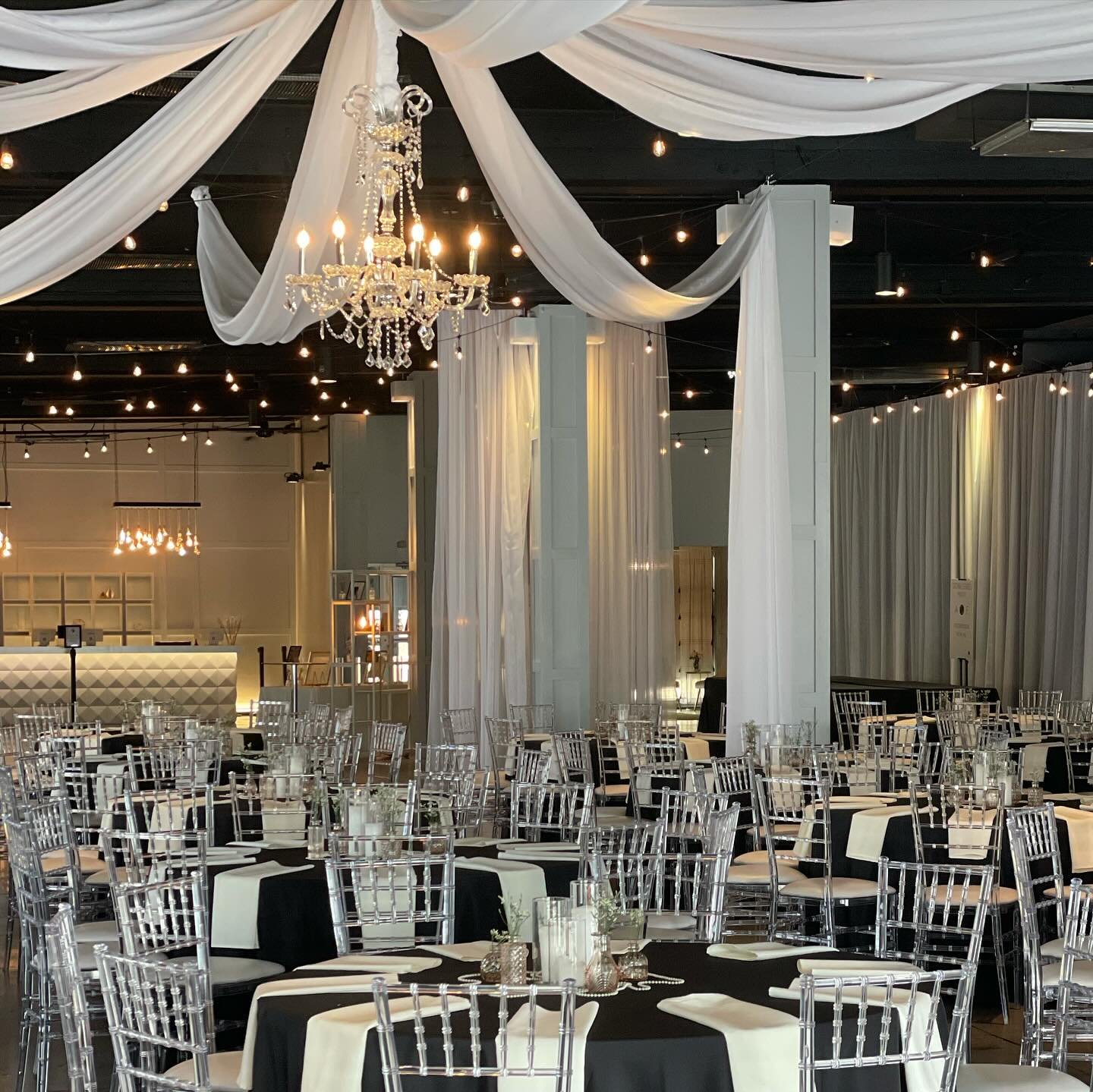Meet our most popular add-on 😍:
8 flowy swags of sheer meet in the center at a glowing chandelier 

We love the elegance it adds to the already-beautiful space! 

What do you think?! 

#weddingmemories #diamondroomomaha #omahabrides #omahavenue #oma