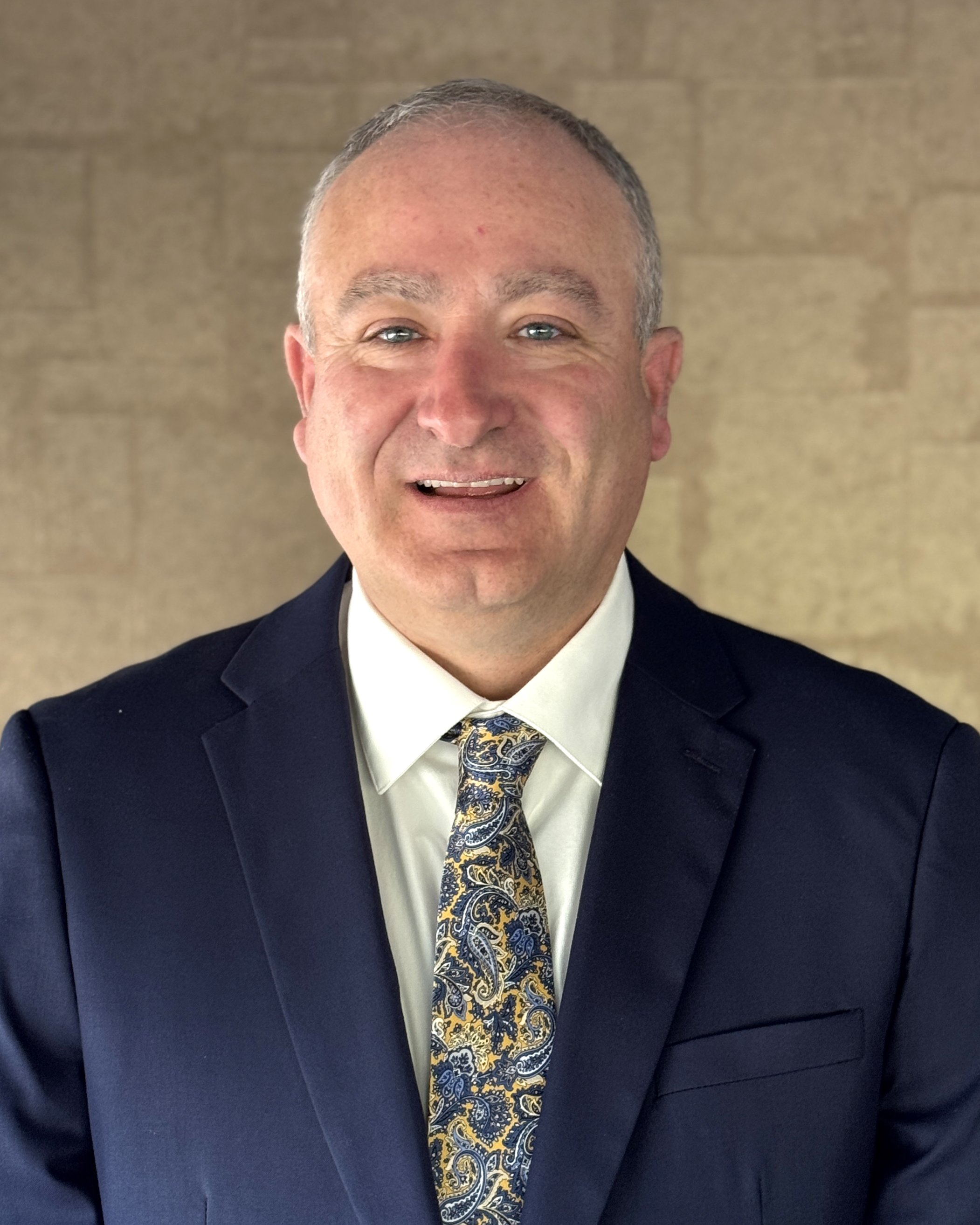 Headshot of COO Chris Taylor