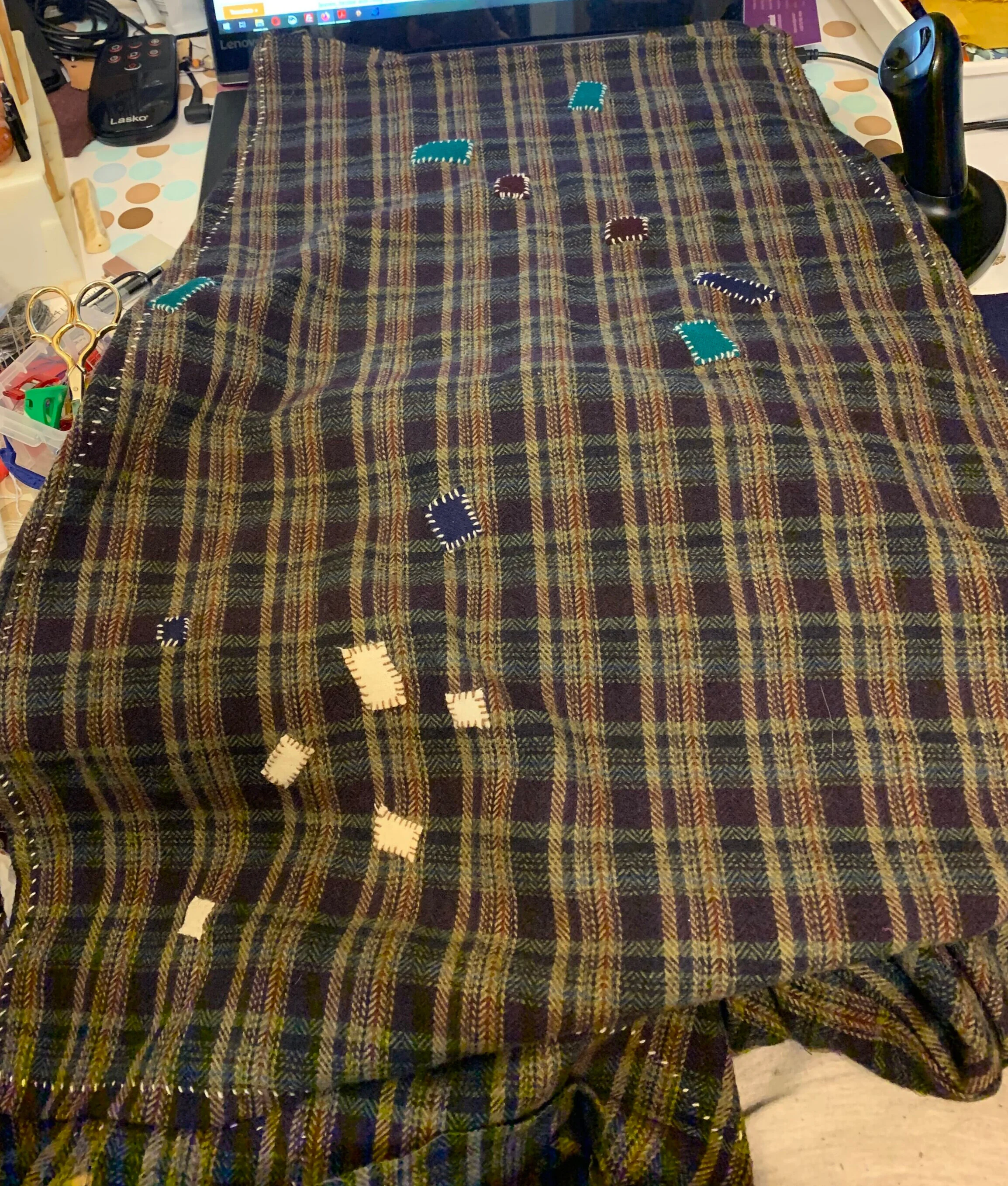i realized that the holes near the shoulder seam looked like the big dipper, so i had to patch them with white.