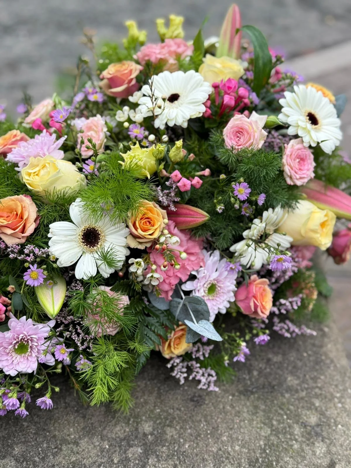 pink and phite funeral flowers.JPG