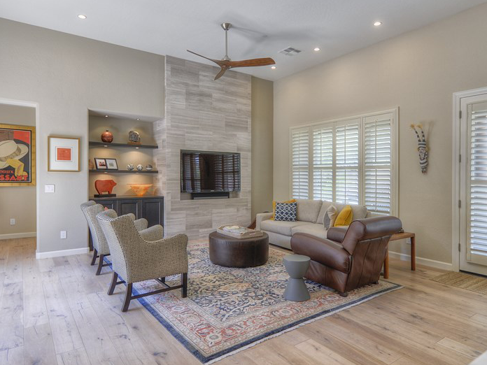 Comfortable Family Room with an eye-catching fireplace treatment