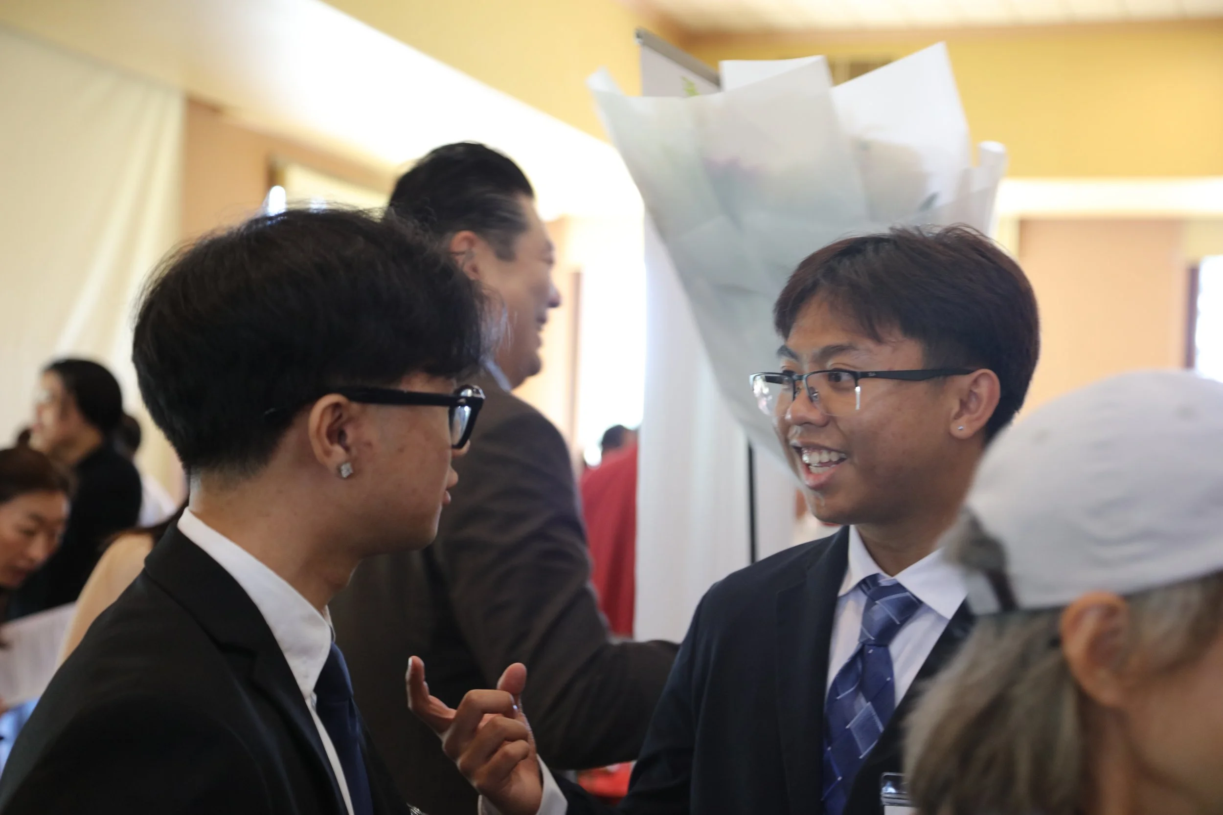 AAEDE's 15th Annual Job & Career Fair — Summer 2026 Interns Jeff Le and Devon Thai connect and exchange thoughts following the guest speaker panel.