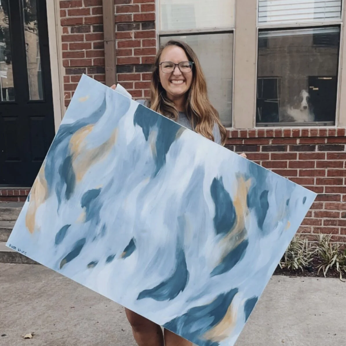 katie with painting.jpg