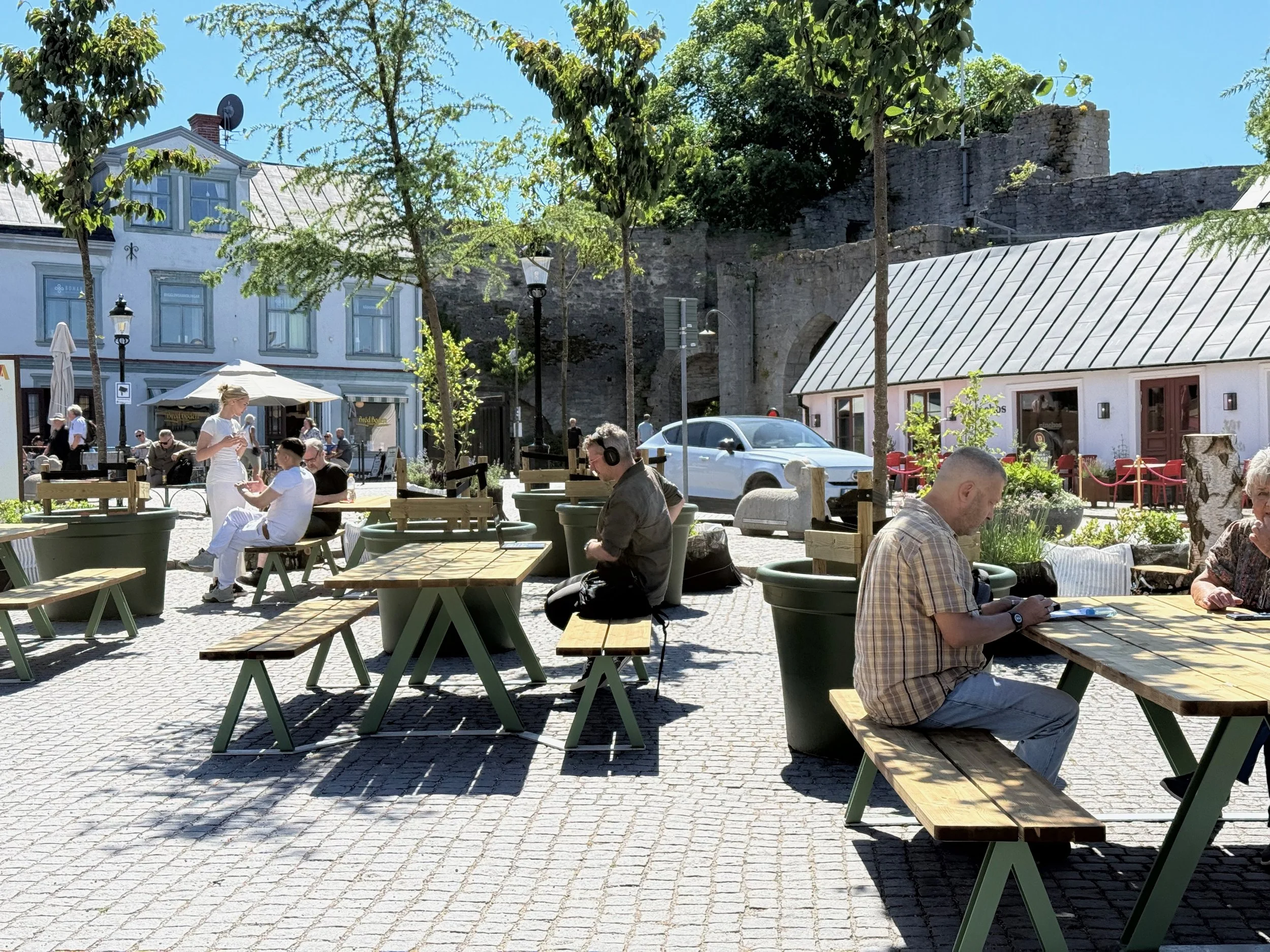People on picnic tables at the South square