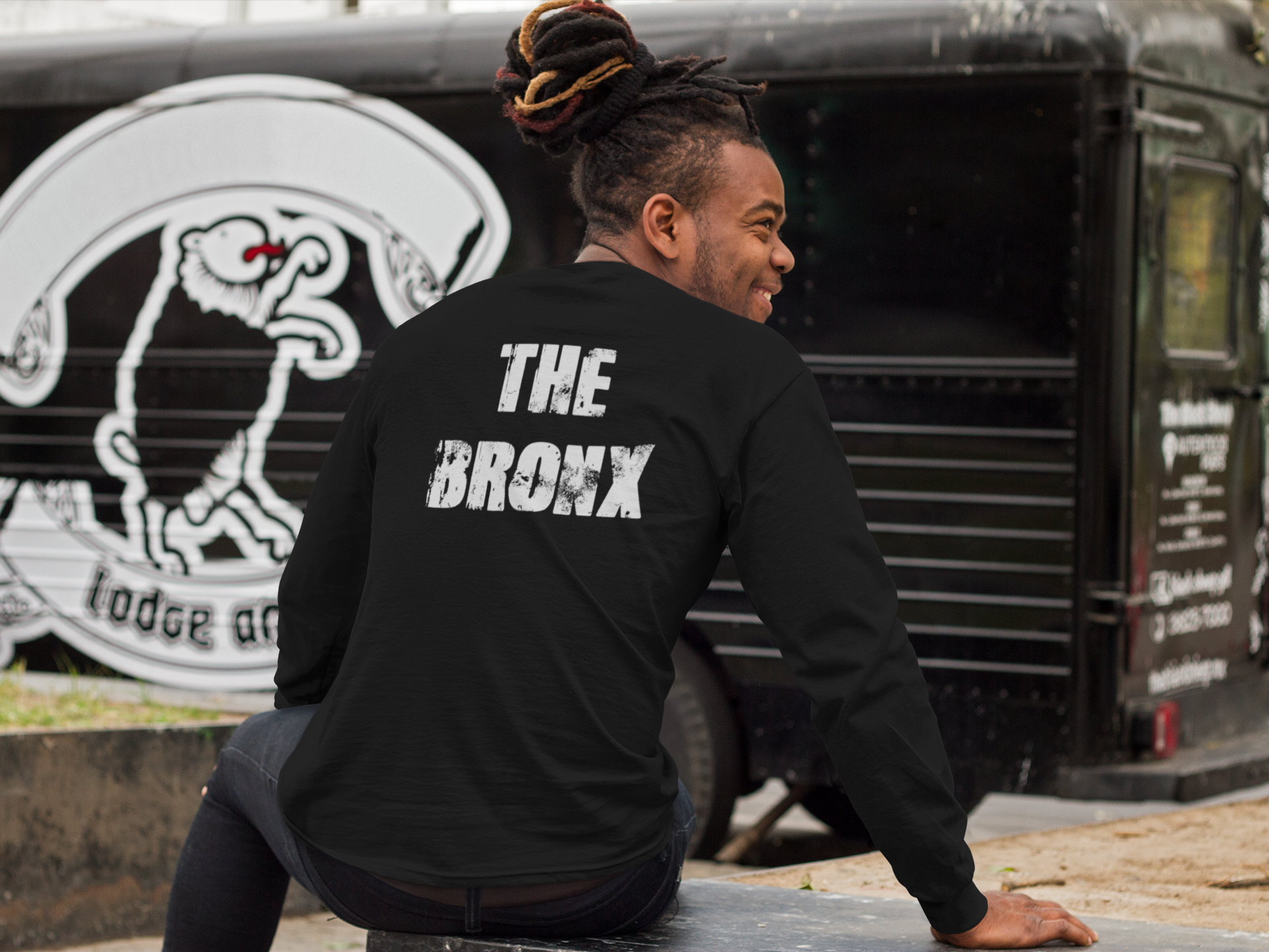 back-view-of-a-man-wearing-a-long-sleeve-tee-mockup-sitting-outdoors-a9290b.png