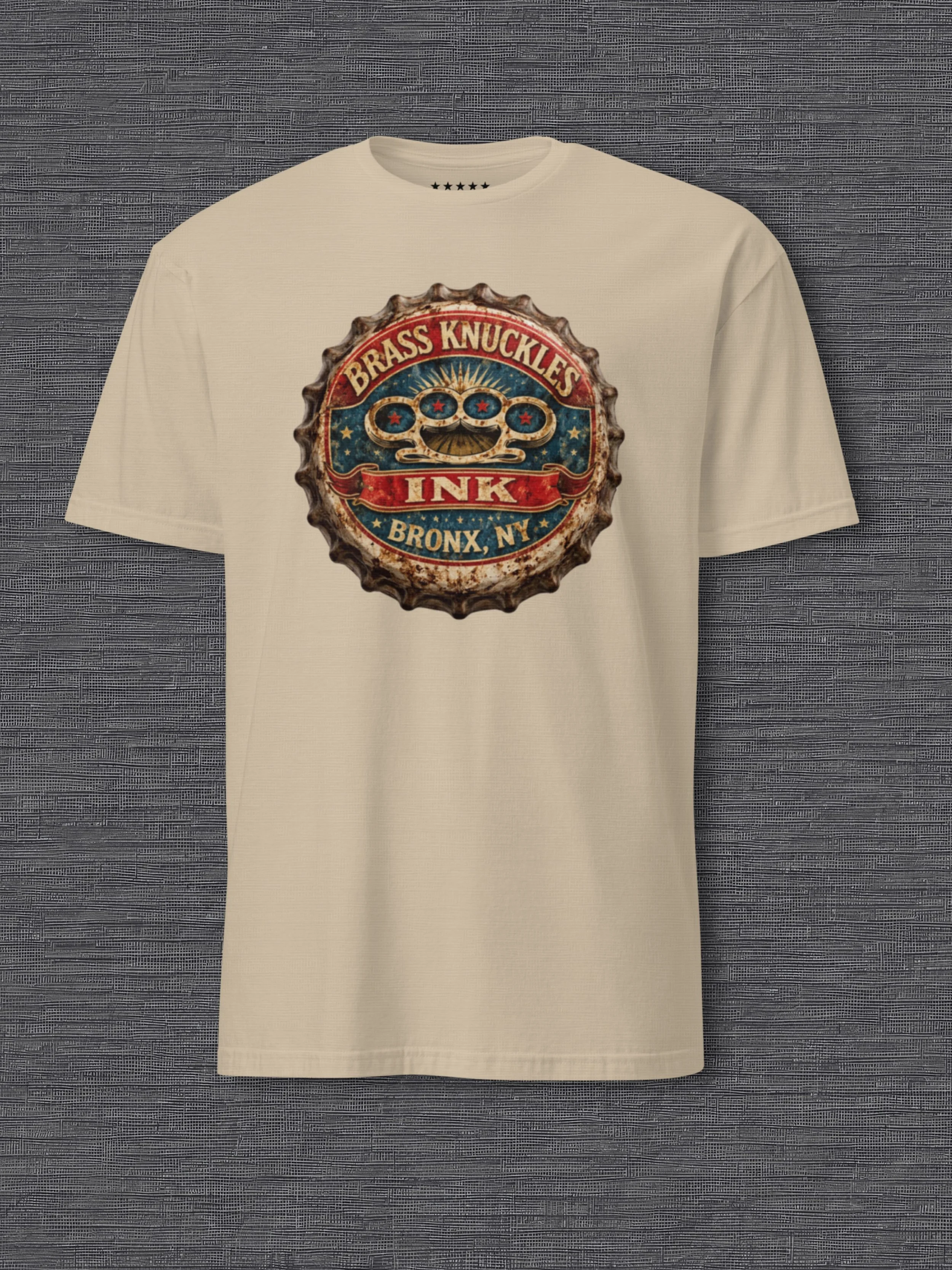 vintage-blue-cap-ink-graphic-centered-sand-t-shirt-mockup-brass-knuckles-ink2.jpg