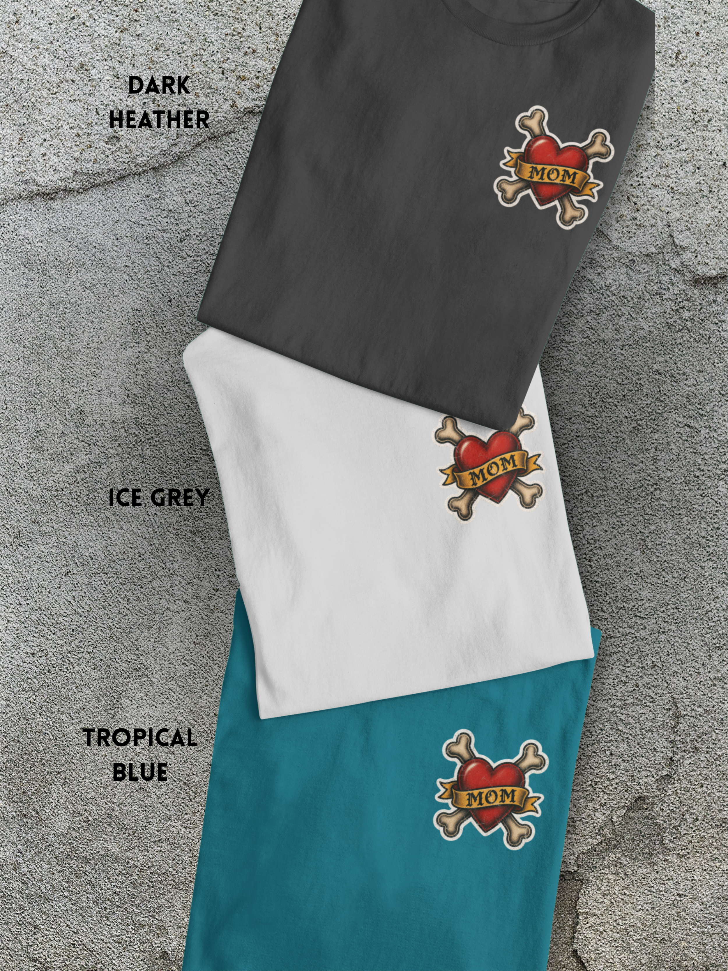 tattooed-frenchie-with-mom-heart-folded-Dark-heather-ice-grey-tropical-blue-tshirts-flatlay-mockup.png