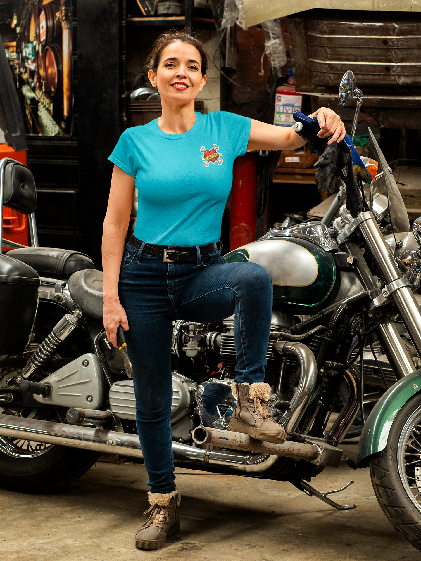 lifestyle-tropical-blue-t-shirt-front-mockup-of-a-biker-wearing-porkchop-cartel-tattooed-frenchie-with-mom-heart.png