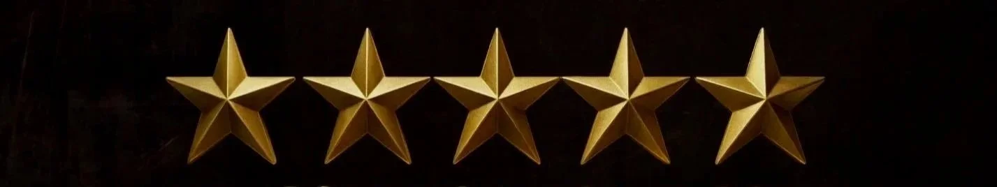 Six gold stars arranged in a row on a black background.