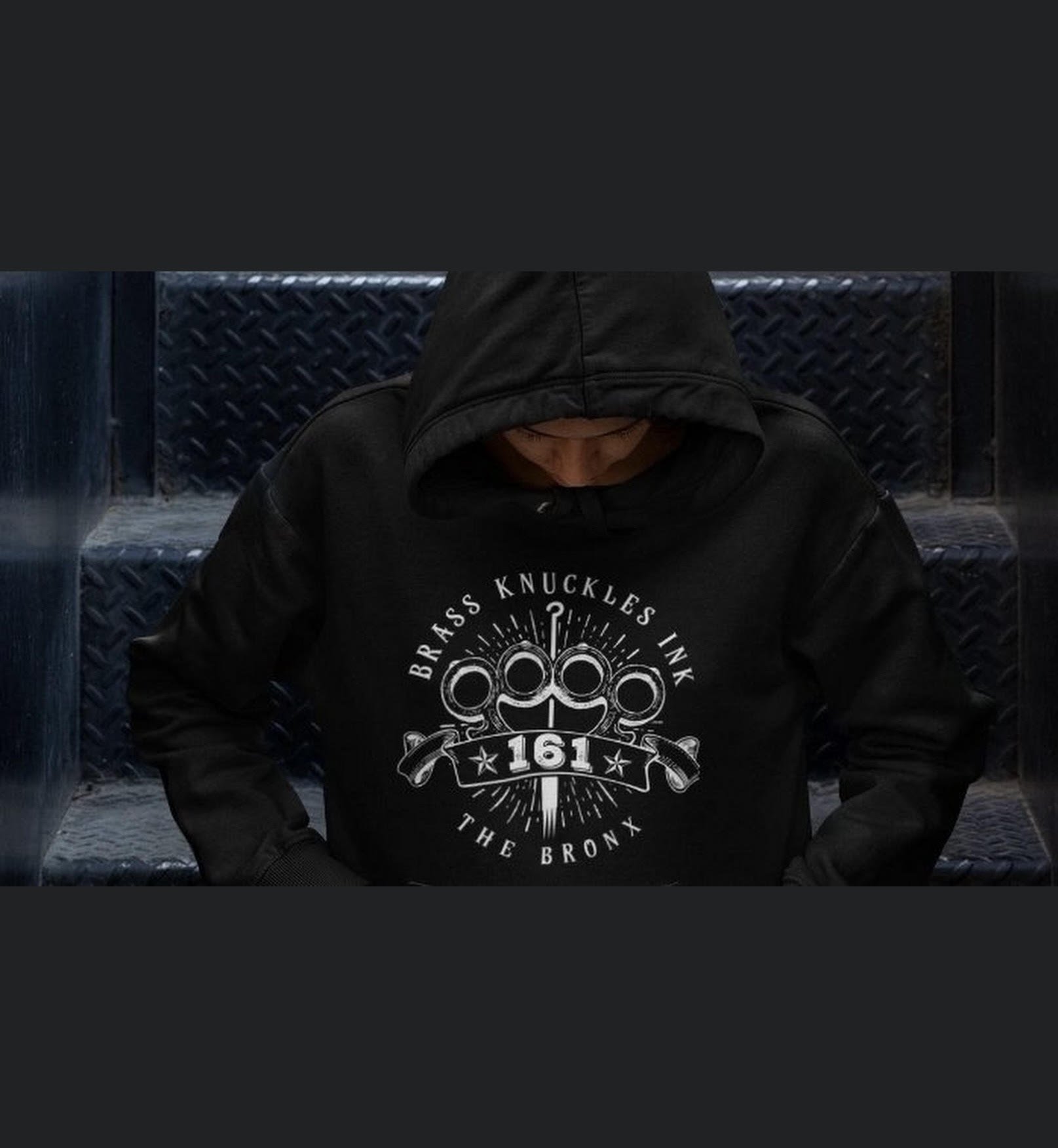 ModelWithHoodie.BrassKnucklesInk.jpg