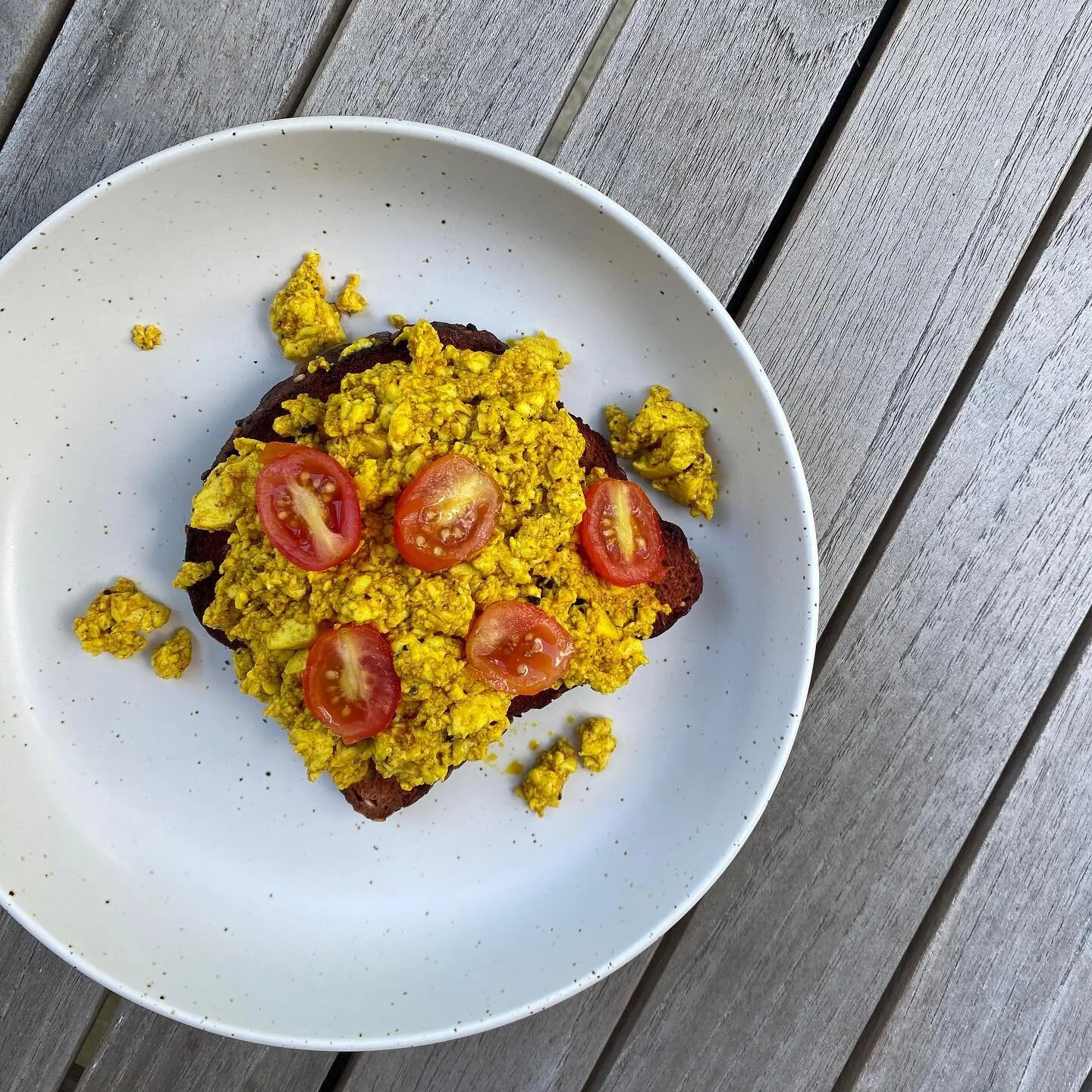 scrambled eggs, hold the chicken

Scrambled Soy:
Saut&eacute;ing firm, dried tofu in olive oil with the following seasonings, achieves a similar texture and taste to scrambled eggs that I love on a bagel or topped on toast. As always, finished with m