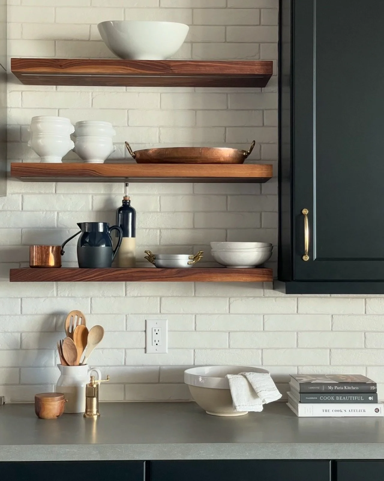 I recently gave my kitchen a facelift, transforming it from a bland space with cream cabinets and black handles to a warm and modern haven. I&rsquo;m obsessed with open shelving and love how it adds visual interest and allows me to display my favorit