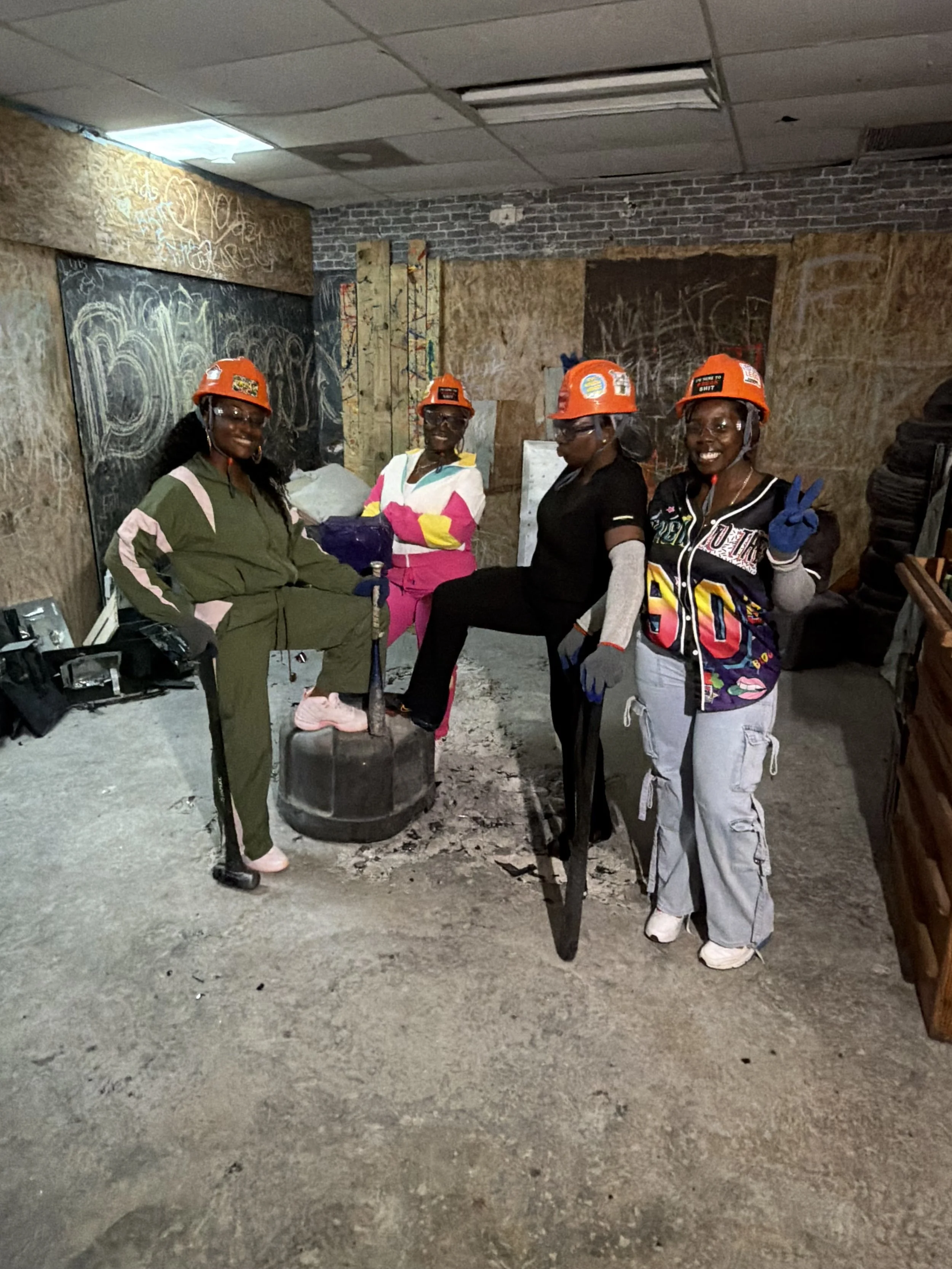 A crew visiting The Smashit House