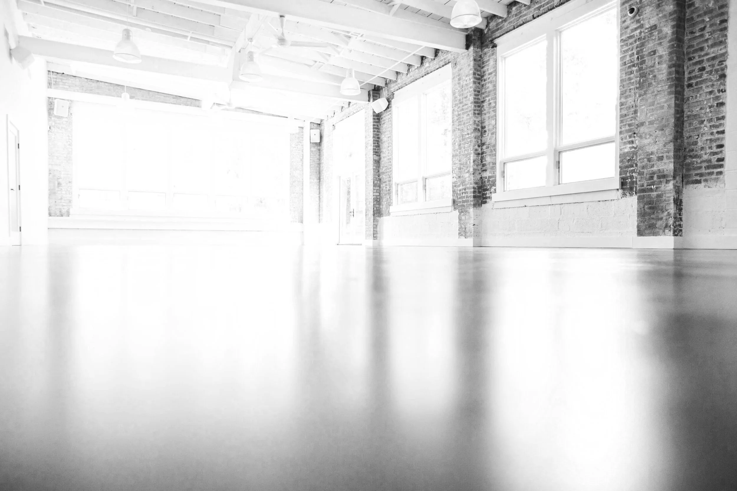 Interior of SUMMUS designed by Gabriel Messuti, using light, proportion, and material restraint to resolve complexity into a unified experience.