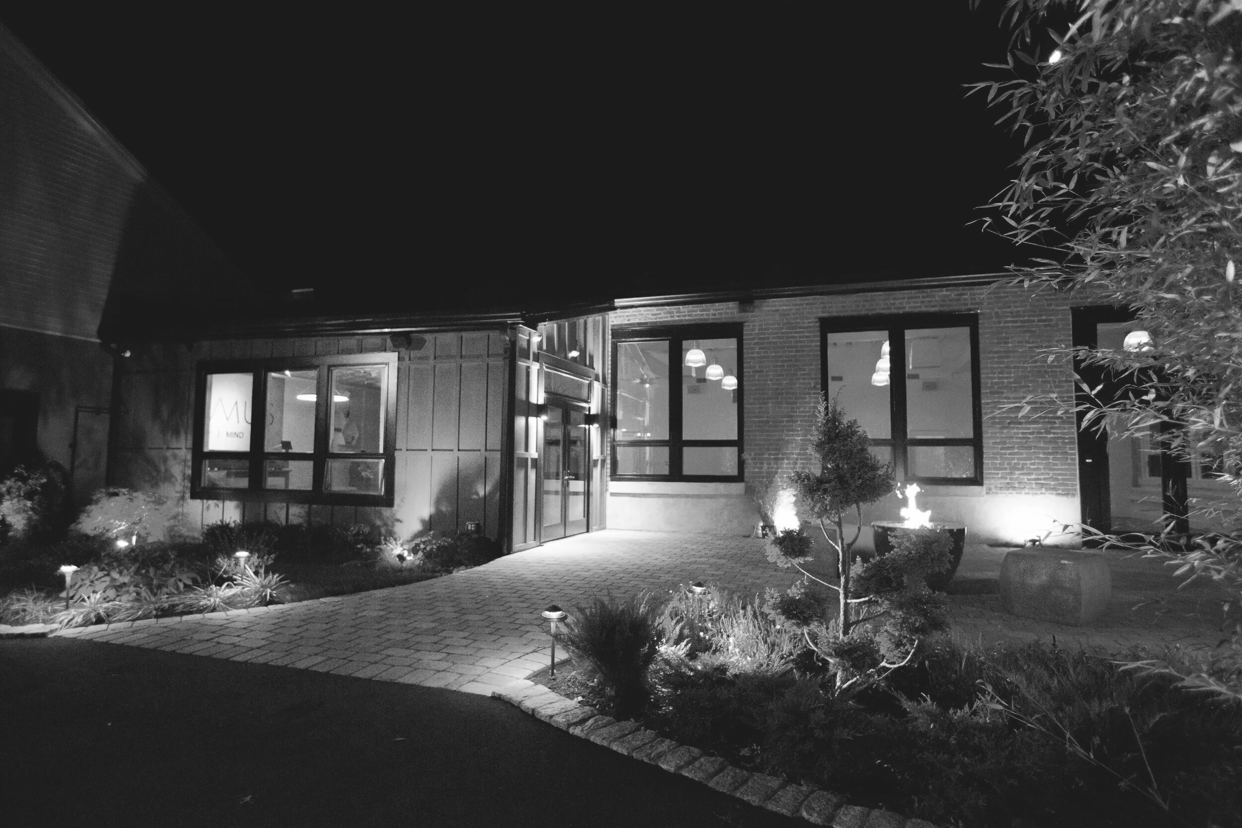 Exterior of SUMMUS Yoga & Jiu Jitsu, a custom-designed wellness facility integrating architecture, landscape, and performance systems, designed and built by Gabriel Messuti