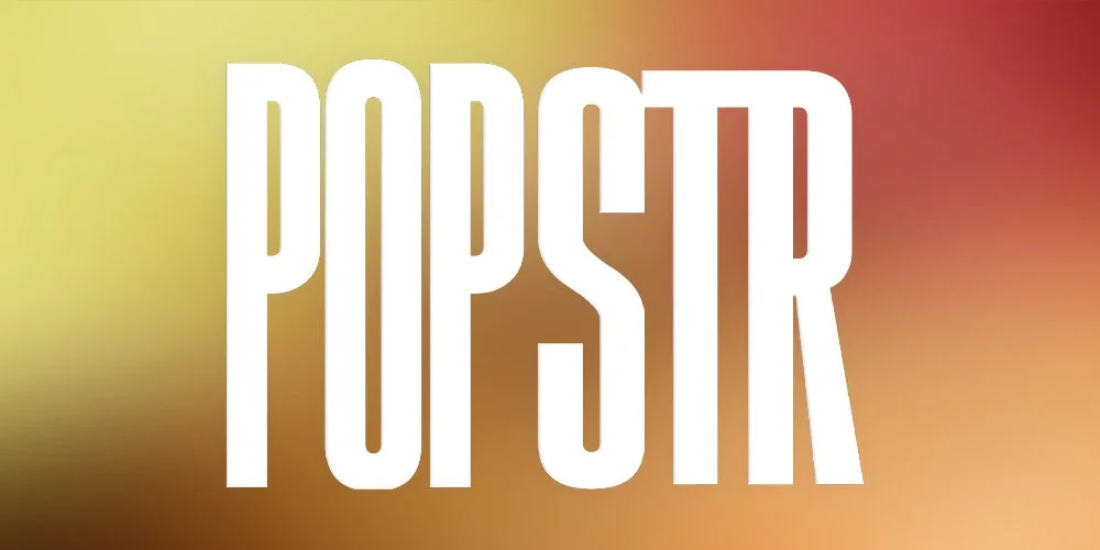 The word 'PUPSIR' in white letters on a blurred gradient background of yellow, red, and brown.