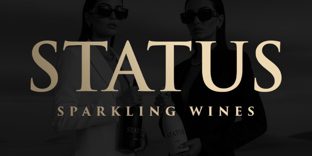 Two women wearing dark sunglasses and suits holding bottles of wine with the word 'STATUS' and subtitle 'SPARKLING WINES' over a dark background.