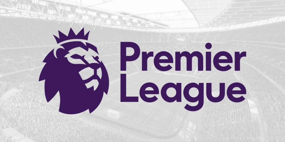Premier League logo with purple lion's head and star crown, over a blurred aerial view of a soccer stadium.