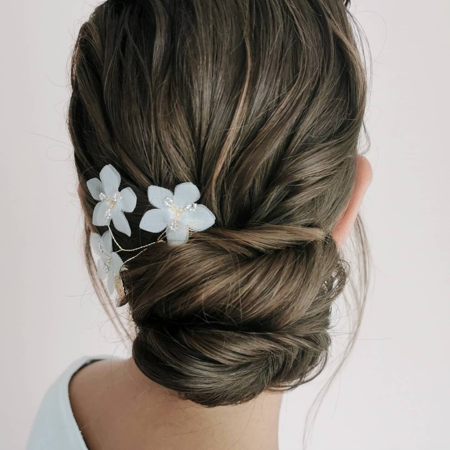 THERE ARE SO MANY OPTIONS for a low bun depending on your length and thickness of hair.
Dont forget though padding and an added hair extension can be a hair stylists best friend for adding a little extra help when styling wedding hair on shorter fine