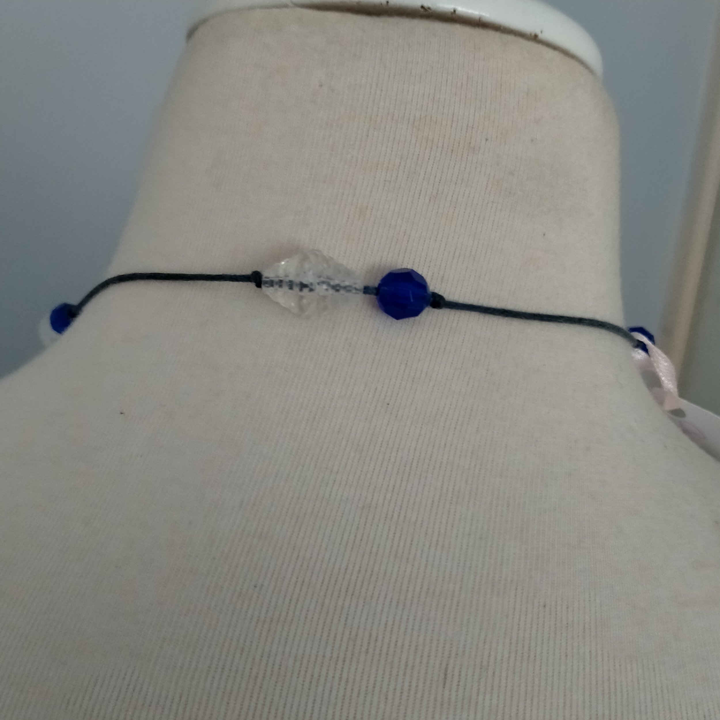 A beautiful crafted necklace. Made using crystal, rondelles, glass, resin, acrylic and metal beading in lilac and navy blue beading.