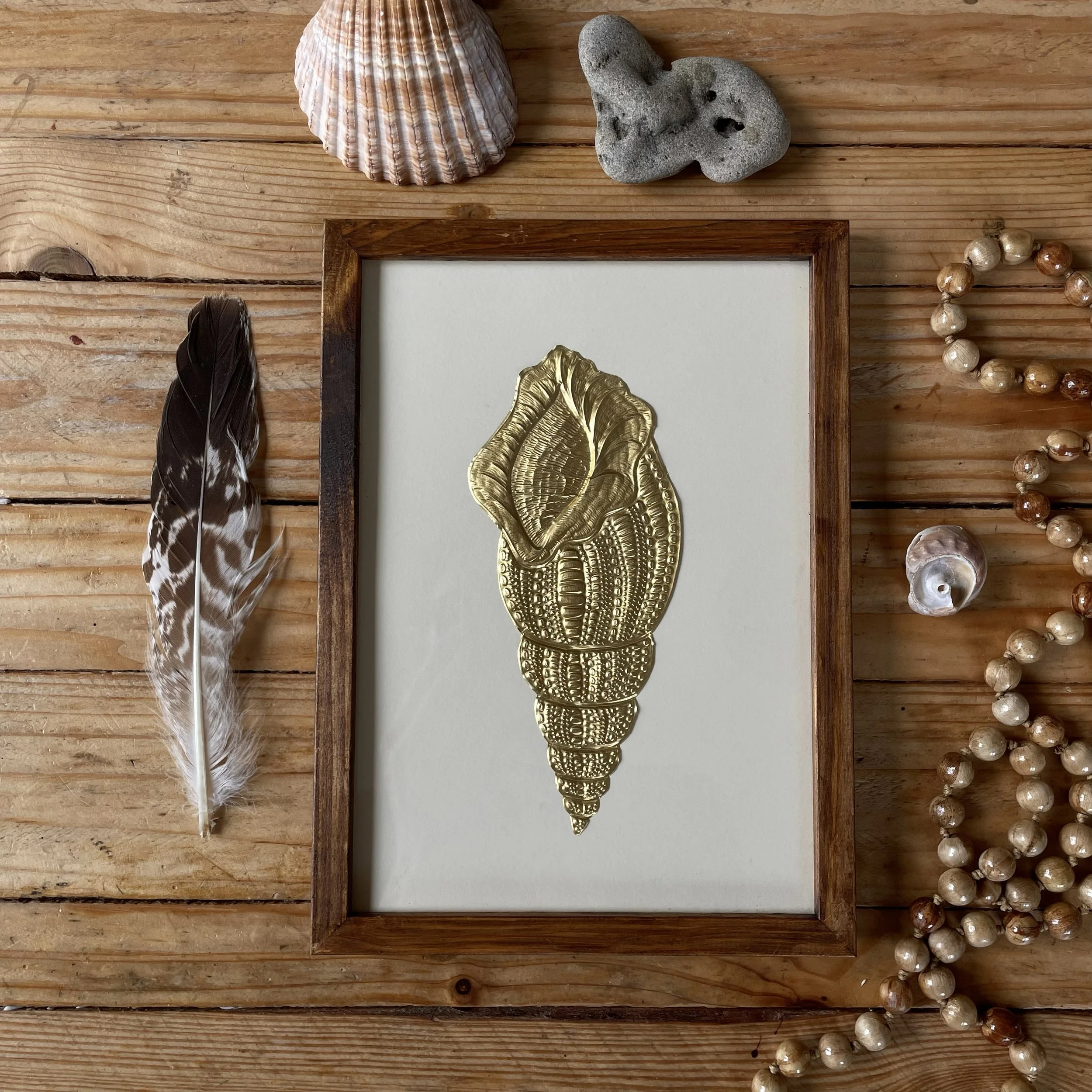 Conque - talisman encadré (moyen)