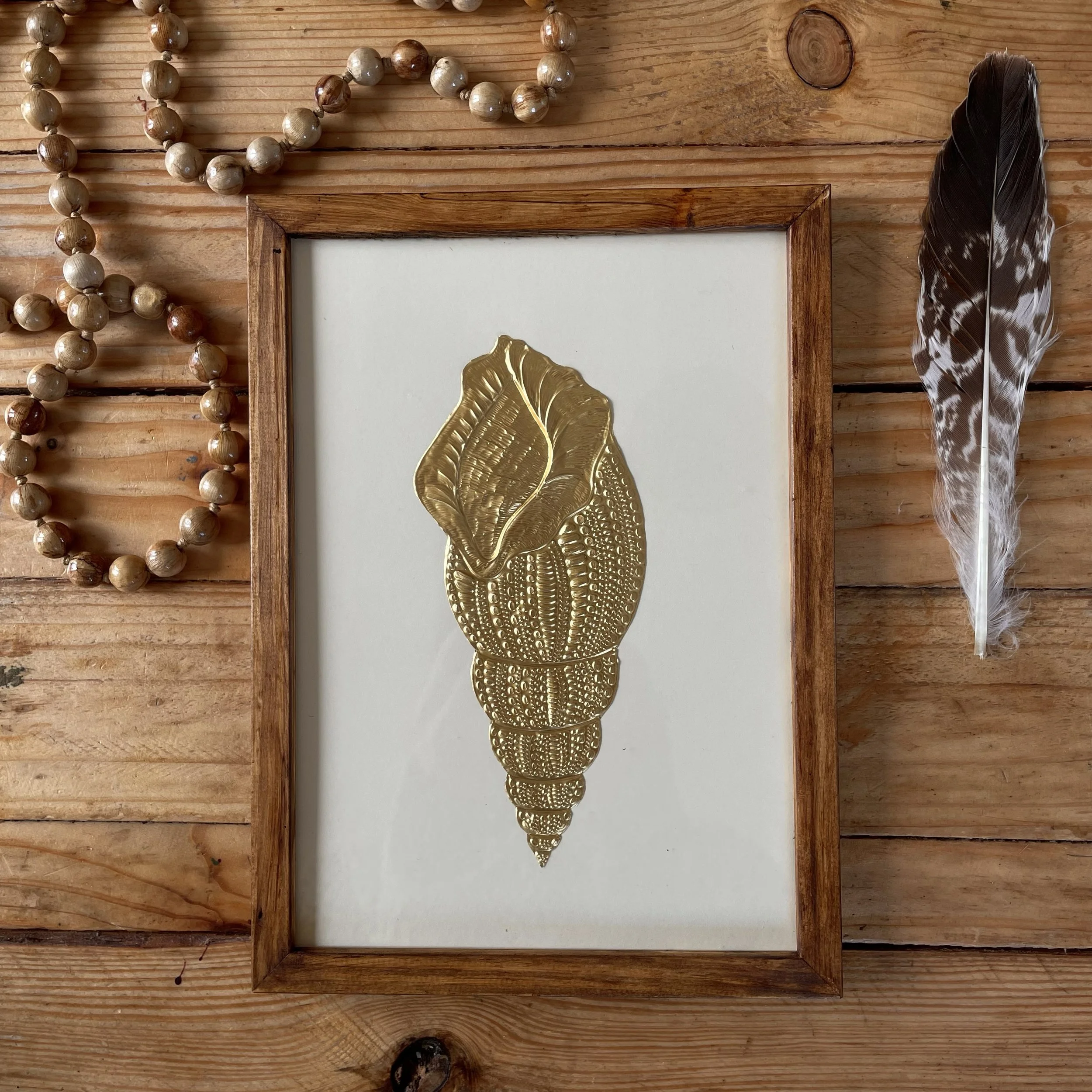 Conque - talisman encadré (moyen)