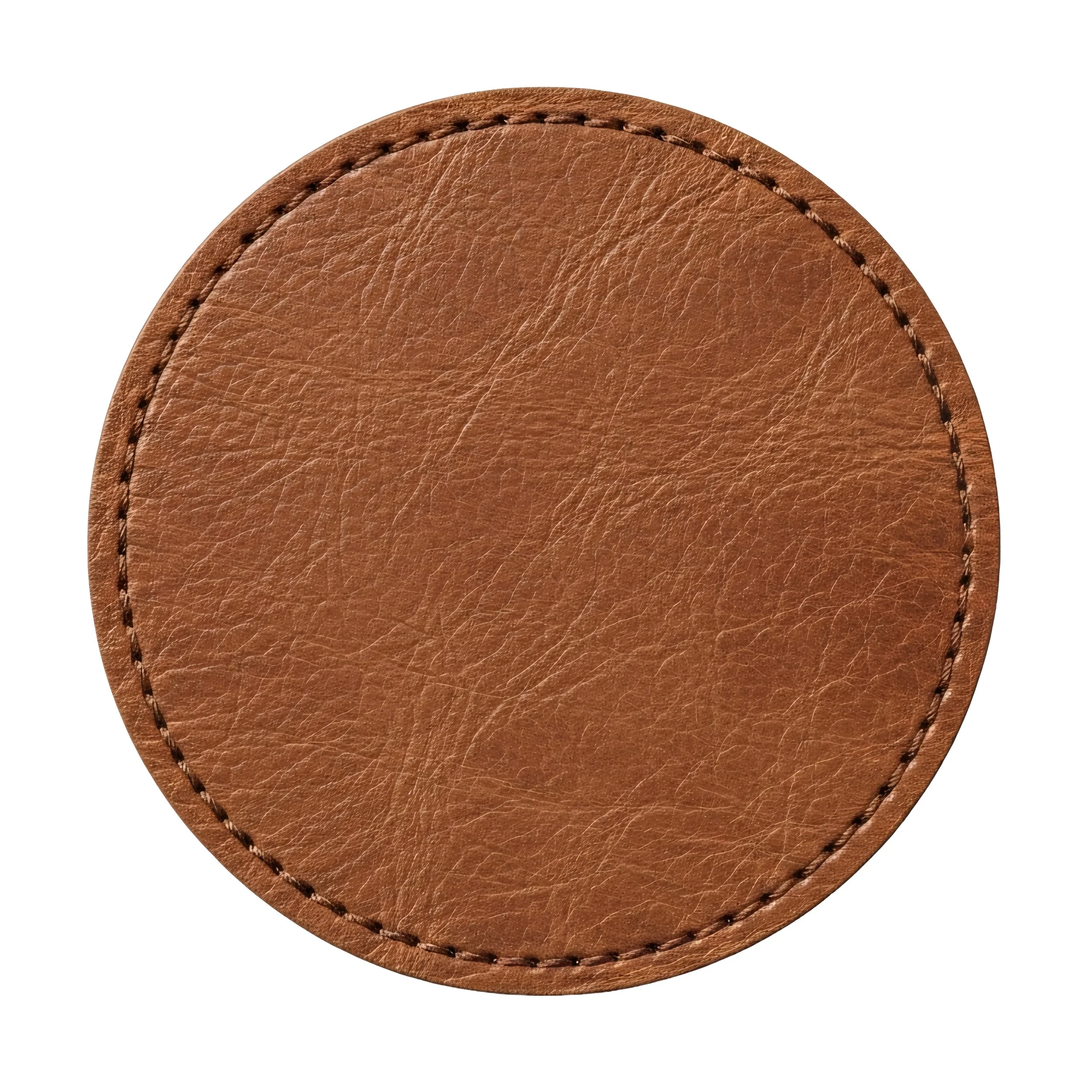 Close-up of a round brown leather object with visible stitching around the edge.