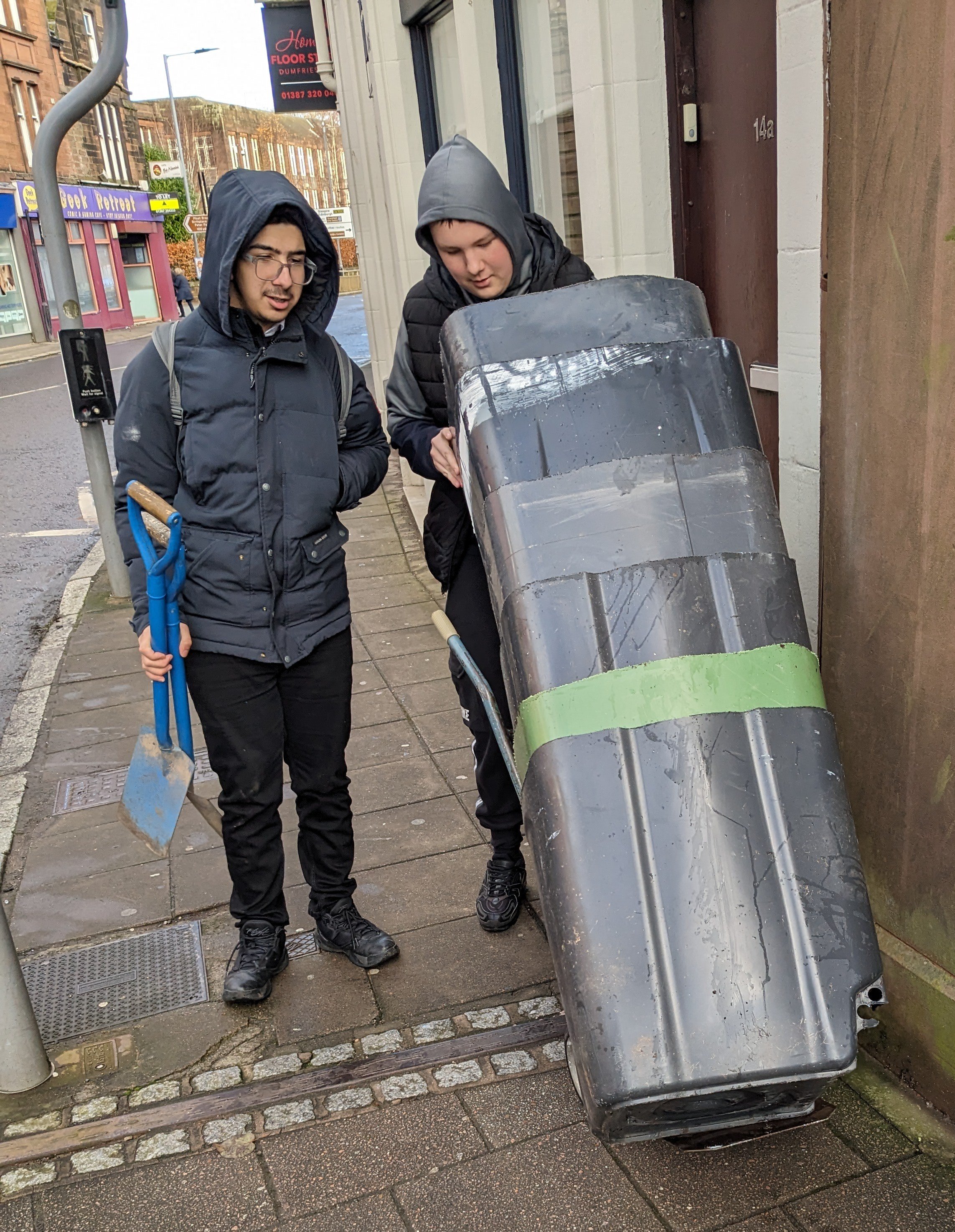 7 - Caner Yildirim and Dorian Harkness taking the final set of bins from the school to the garden site.jpg