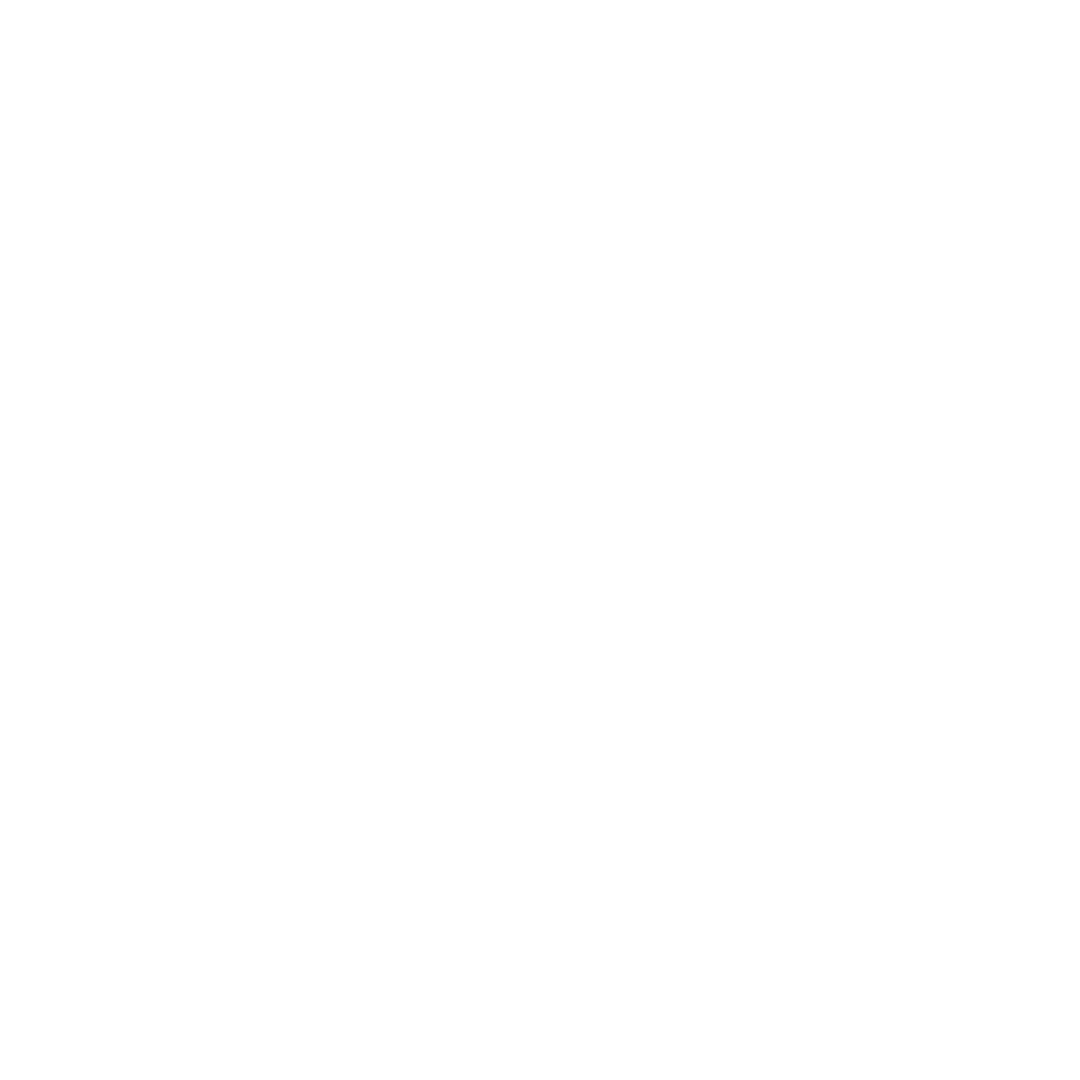 A person flipping a pancake on a griddle with a spatula.