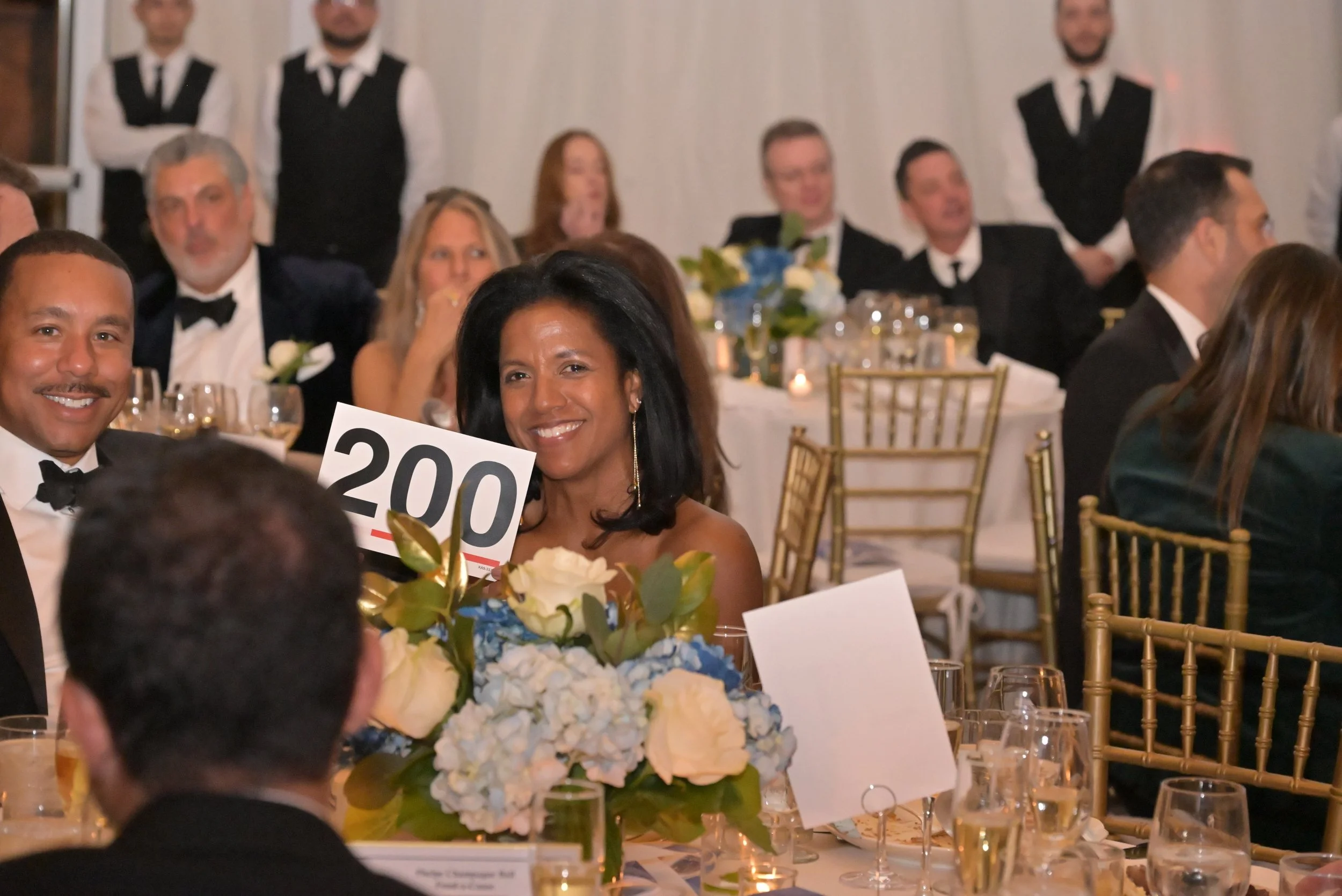 keith and Symonne Bidding at Fund a Cause.jpeg