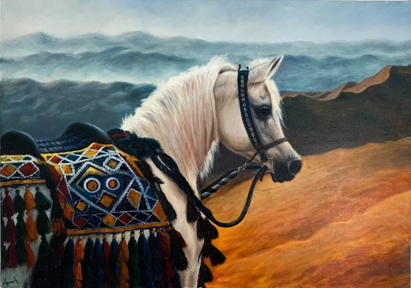 Painting of a white horse wearing a colorful traditional saddle against a desert and mountain landscape.