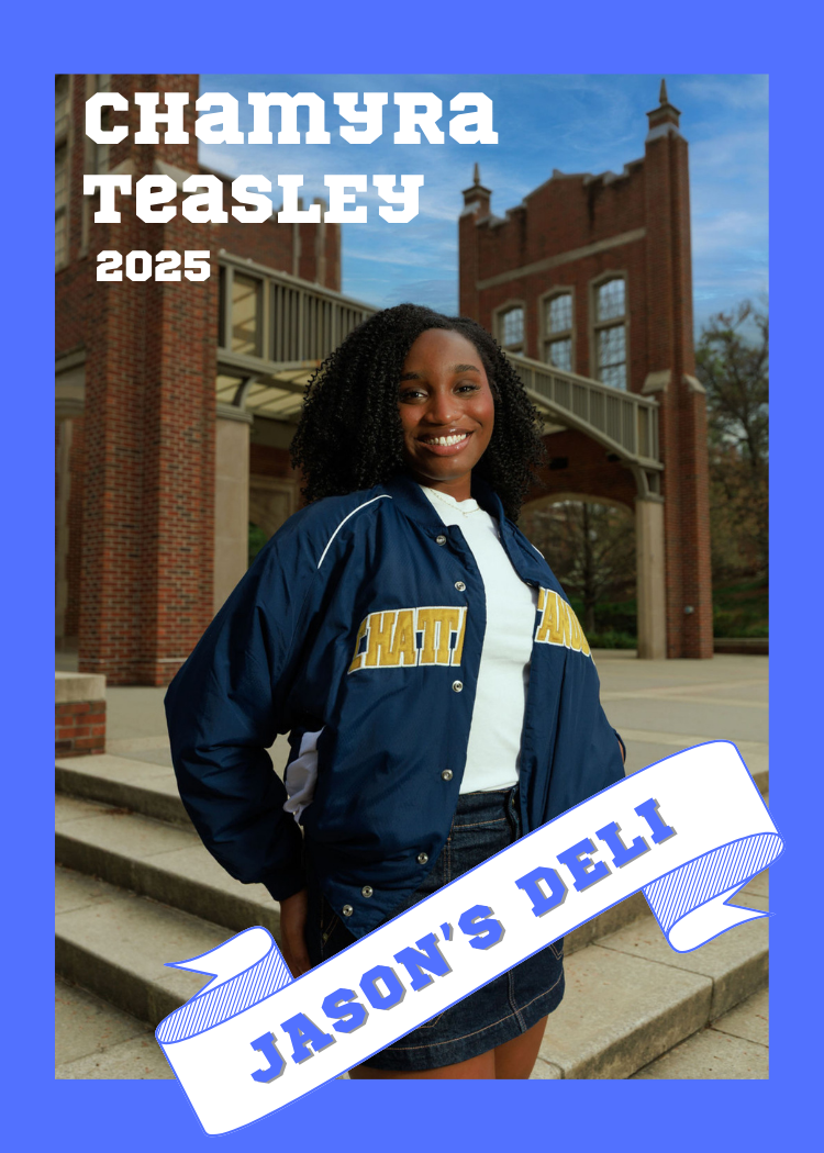 Young woman smiling outdoors in front of a brick building with a cloudy sky. She wears a navy letterman jacket with yellow lettering and a white shirt underneath, standing on concrete steps. The image has text overlay stating "Chamyra Teasley 2025" in the top left and "Jason's Deli" on a ribbon at the bottom.