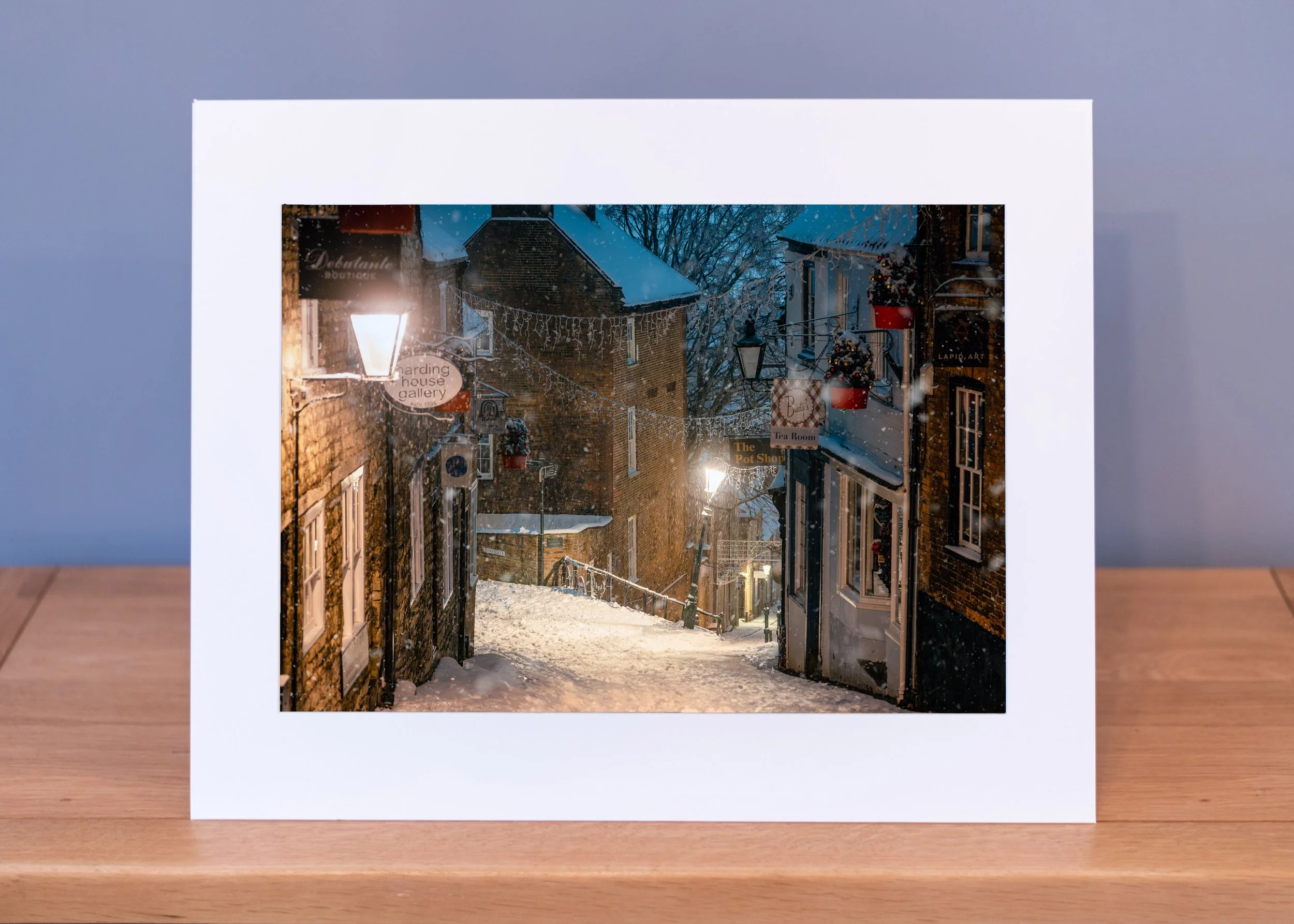 Snow falling half-way up Steep Hill
